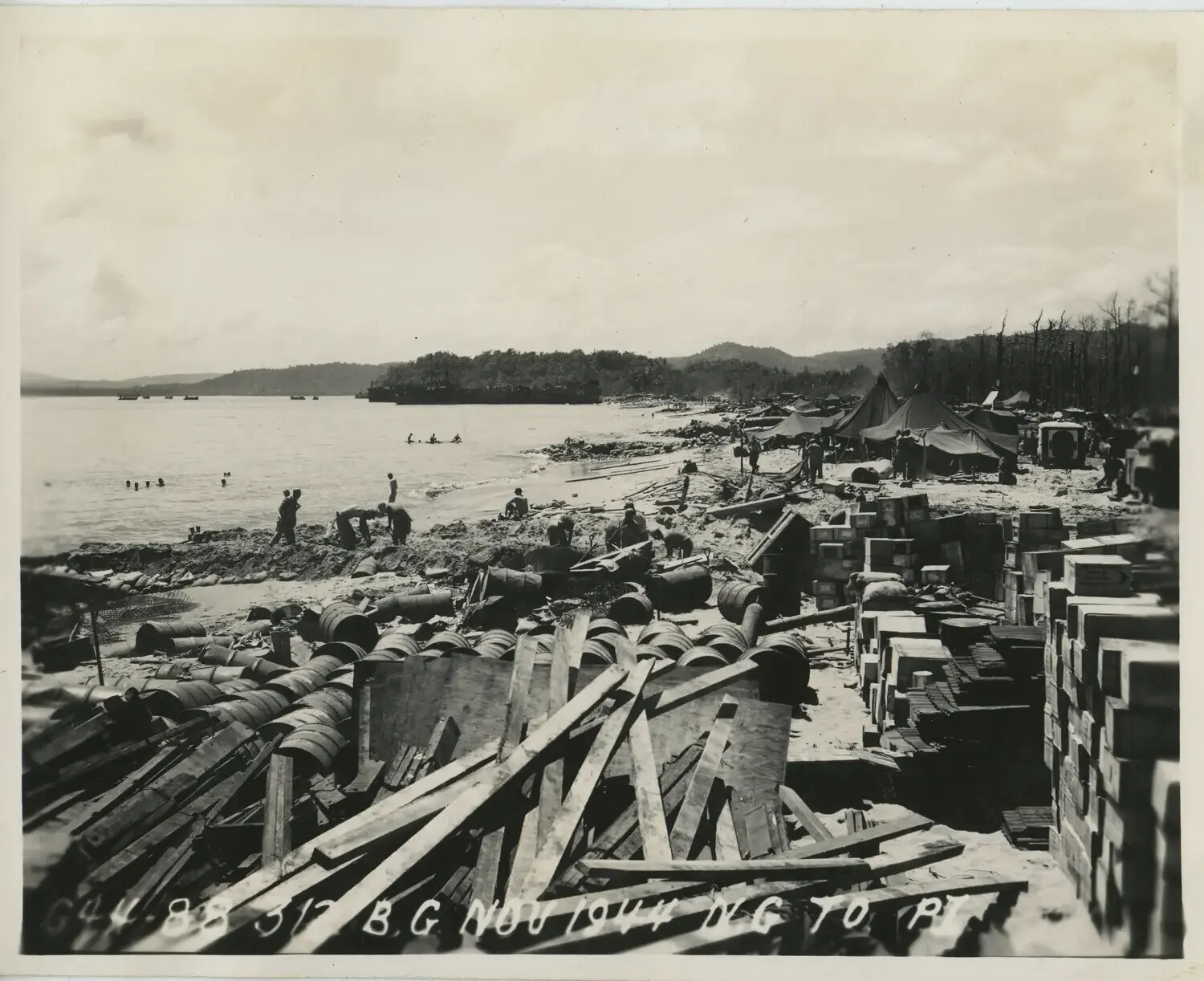 Beach Supply Depot with Troops Swimming, New Guinea, November 1944 - 312th Bombardment Group