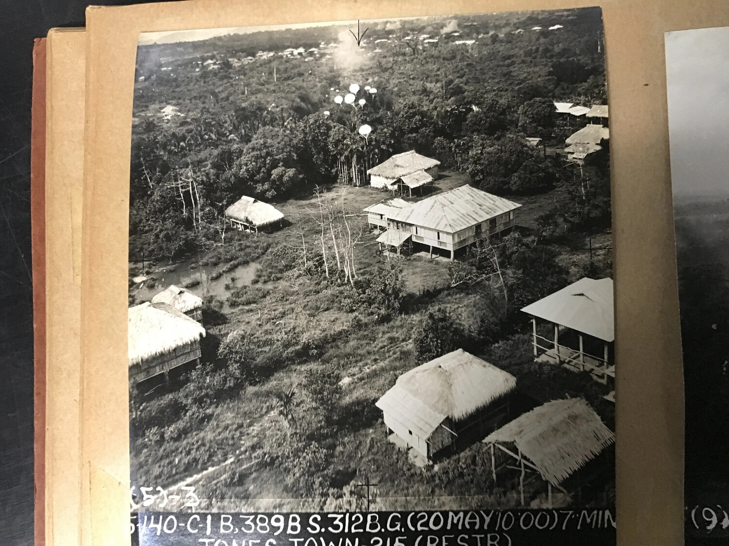 Official Strike Photograph No. 215(RESTR), Frame (5)-3, 389th Bomb Squadron, 312th Bomb Group, Jones Town, Isabela, Luzon, Philippines, 20 May 1945