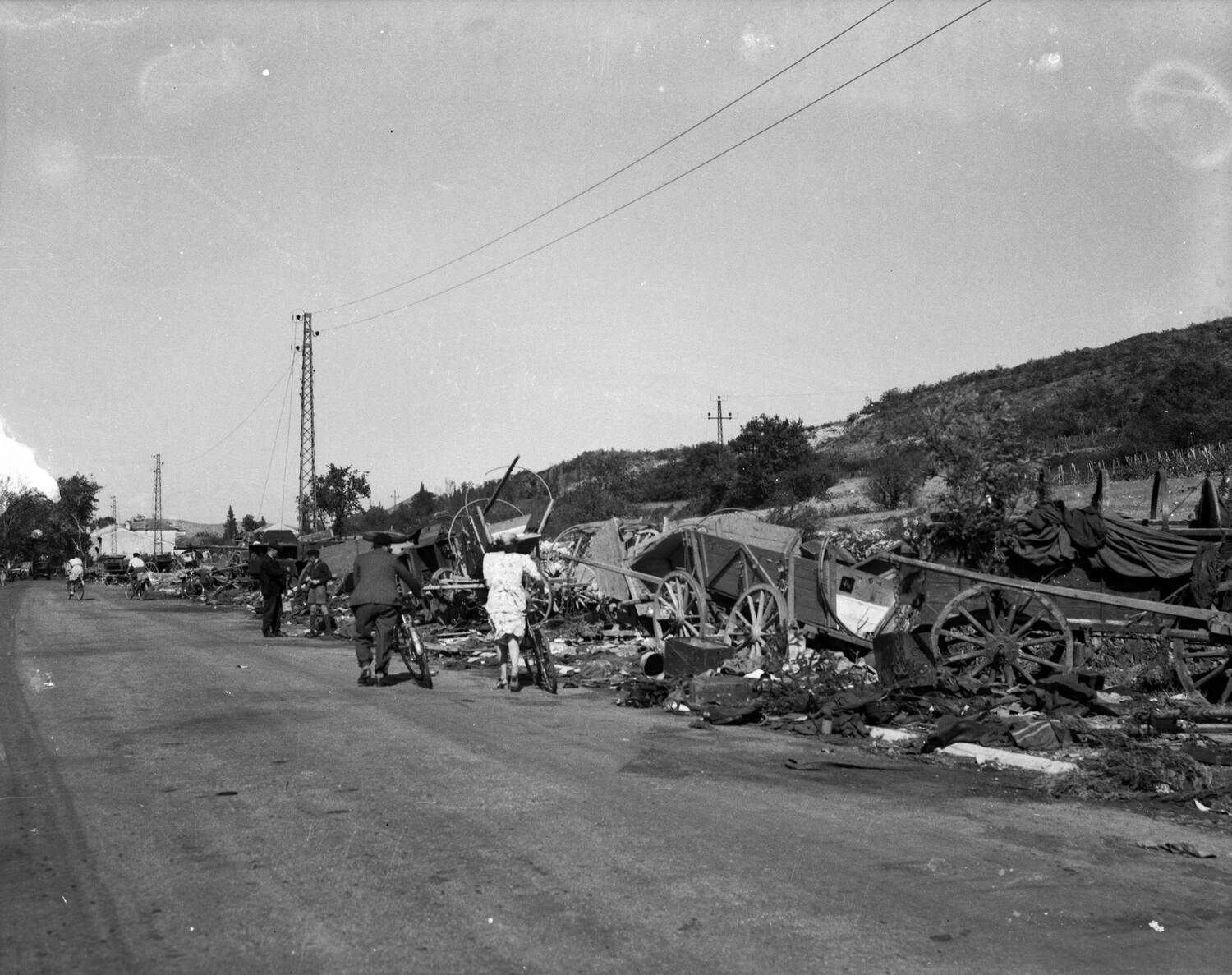 Civilians Passing Wrecked Wagon Column, World War II Germany