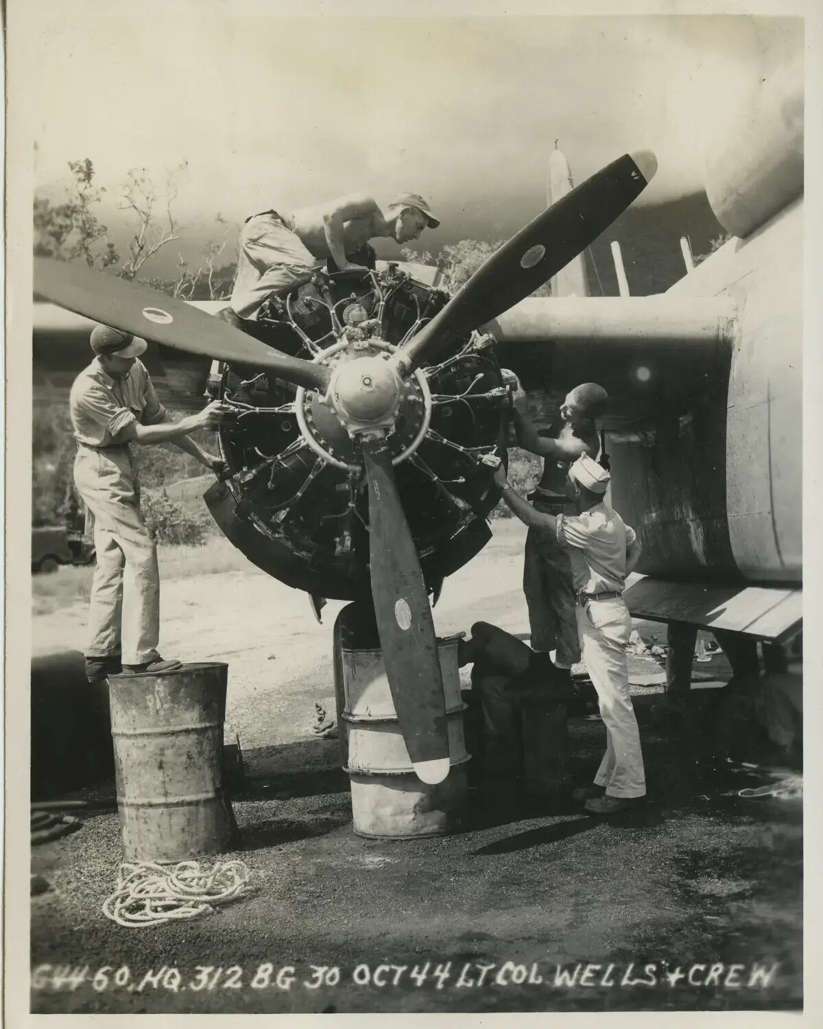 312th Bomb Group Ground Crew Servicing Aircraft Radial Engine — Lt. Col. Wells and Crew, 30 October 1944