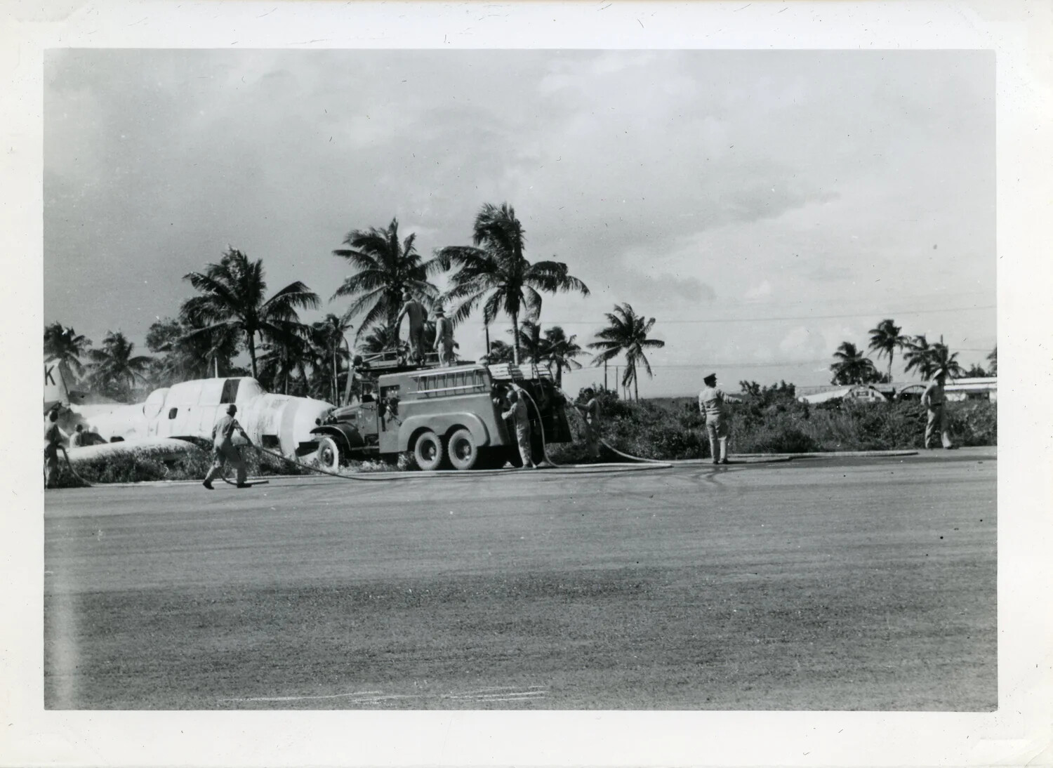 Crash/Fire Crew Responding to Damaged Transport Aircraft, NAS Agana, Guam, VR-6 Collection