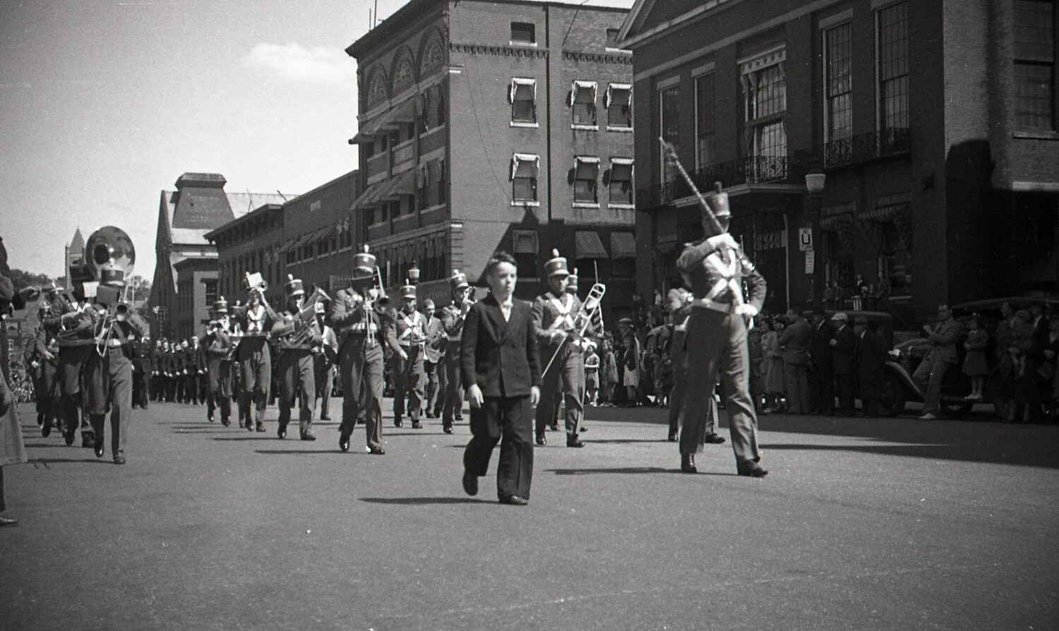 Marching Band Parade on City Street, Boston Area, WWII Era