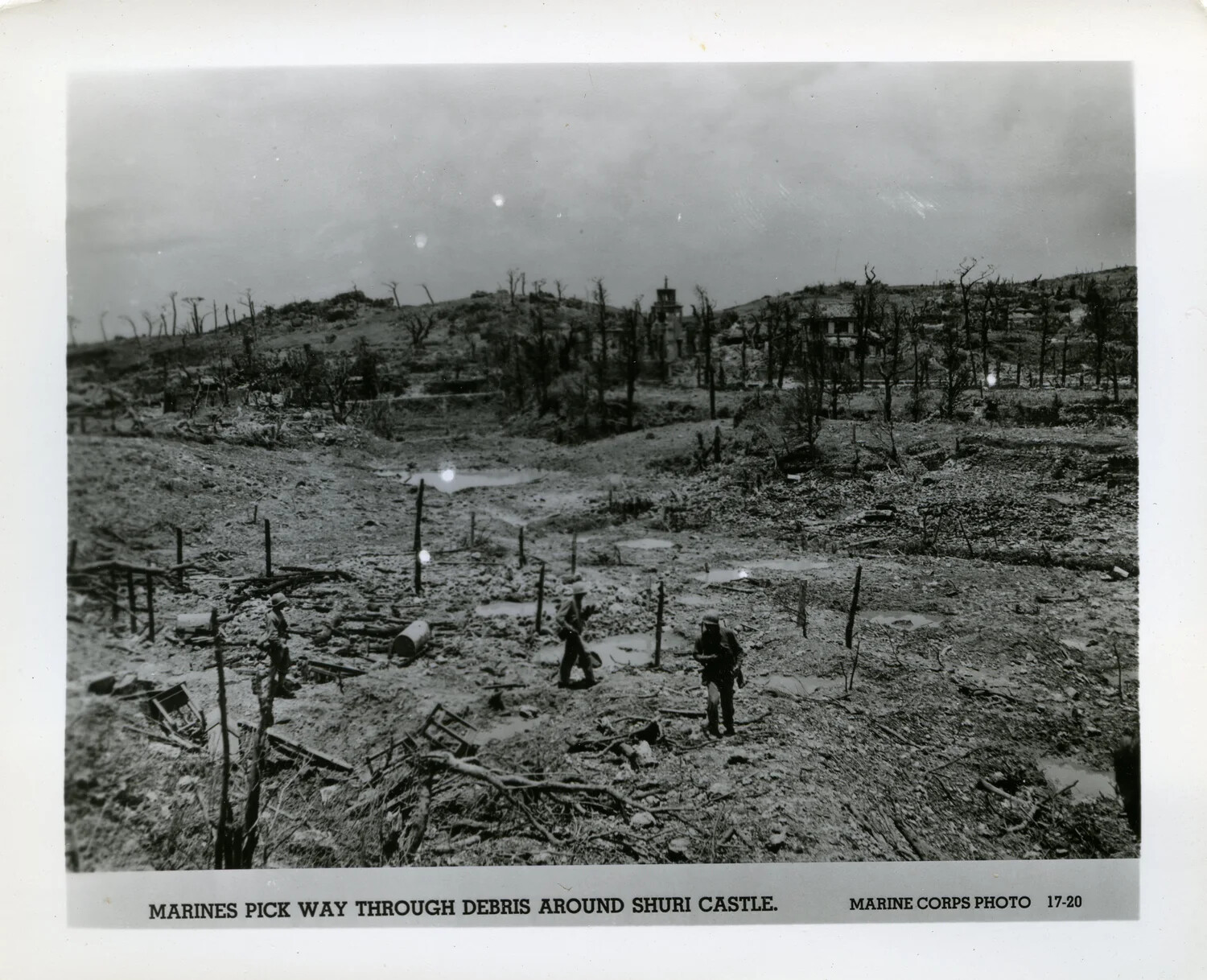 Marines Pick Way Through Debris Around Shuri Castle, Battle of Okinawa, 1945