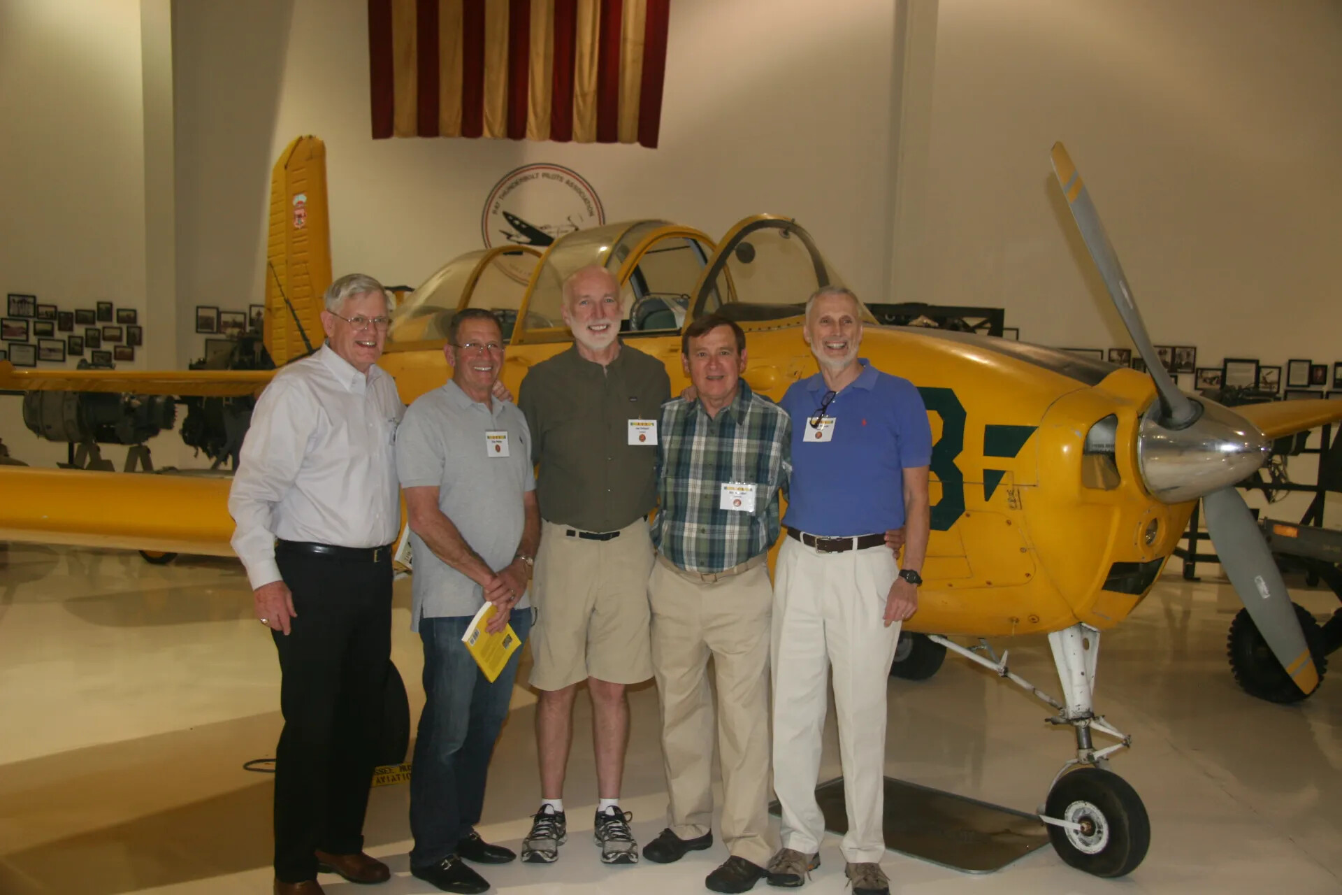 Five Veterans Posing with Vintage Training Aircraft at Aviation Museum, 2016 (Fourth View)