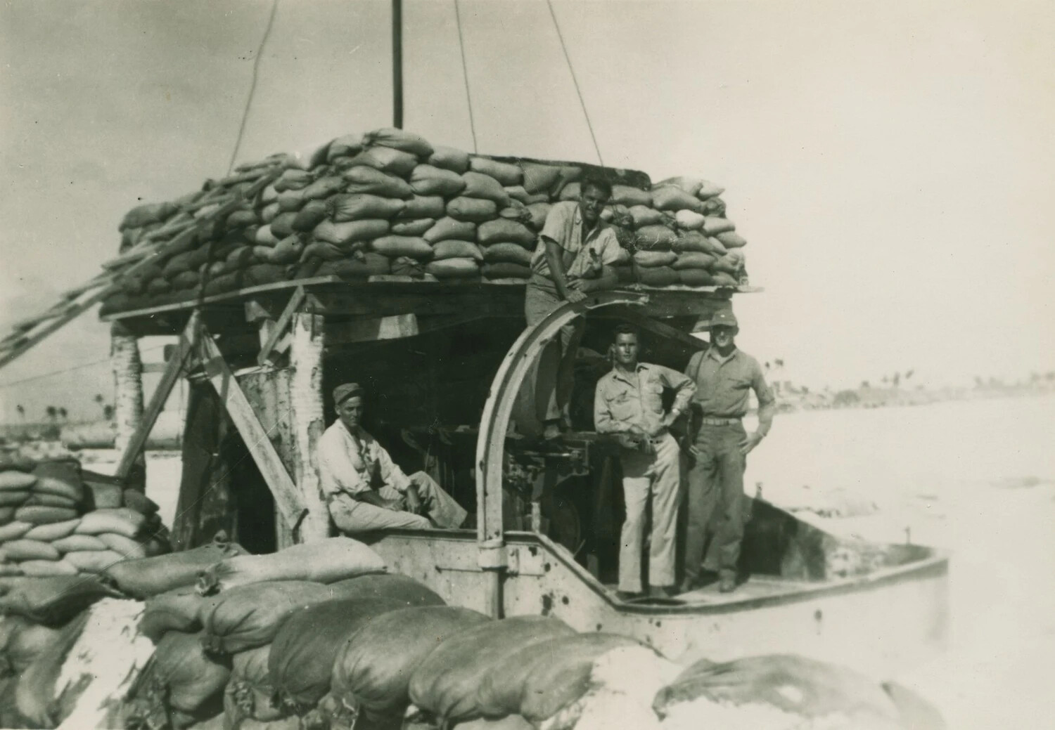 Sandbagged Gun Boat with Servicemen at Pacific Island Beach Position, Pat McAleer Album