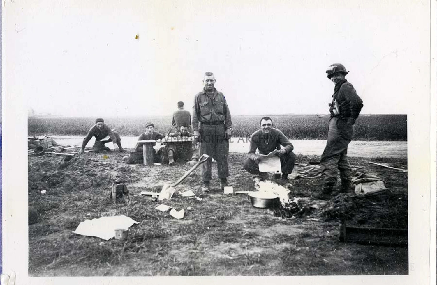 101st Airborne Division Paratroopers at a Field Bivouac, Cooking Fire and Map Reading, European Theater, 1944