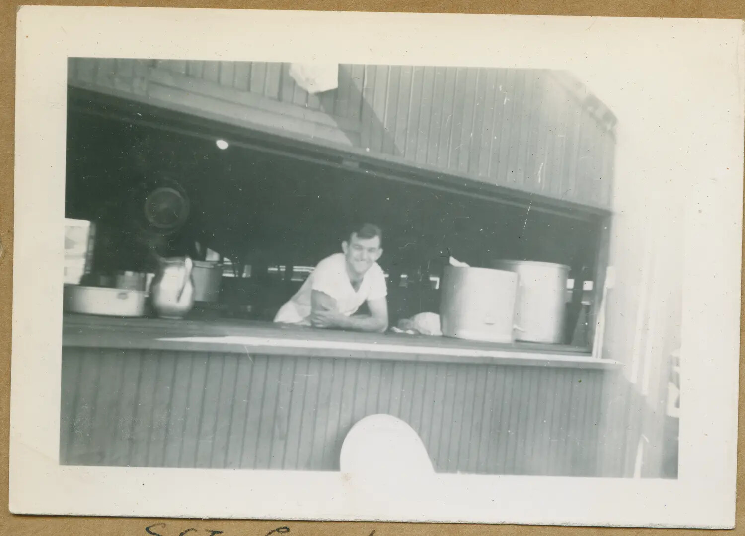 Portrait of 'Sgt Curly' at the Mess Hall Serving Window, Hawaii, WWII