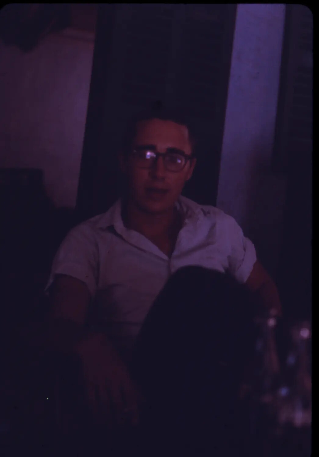 Portrait of Man in Glasses at Informal Gathering, Vietnam