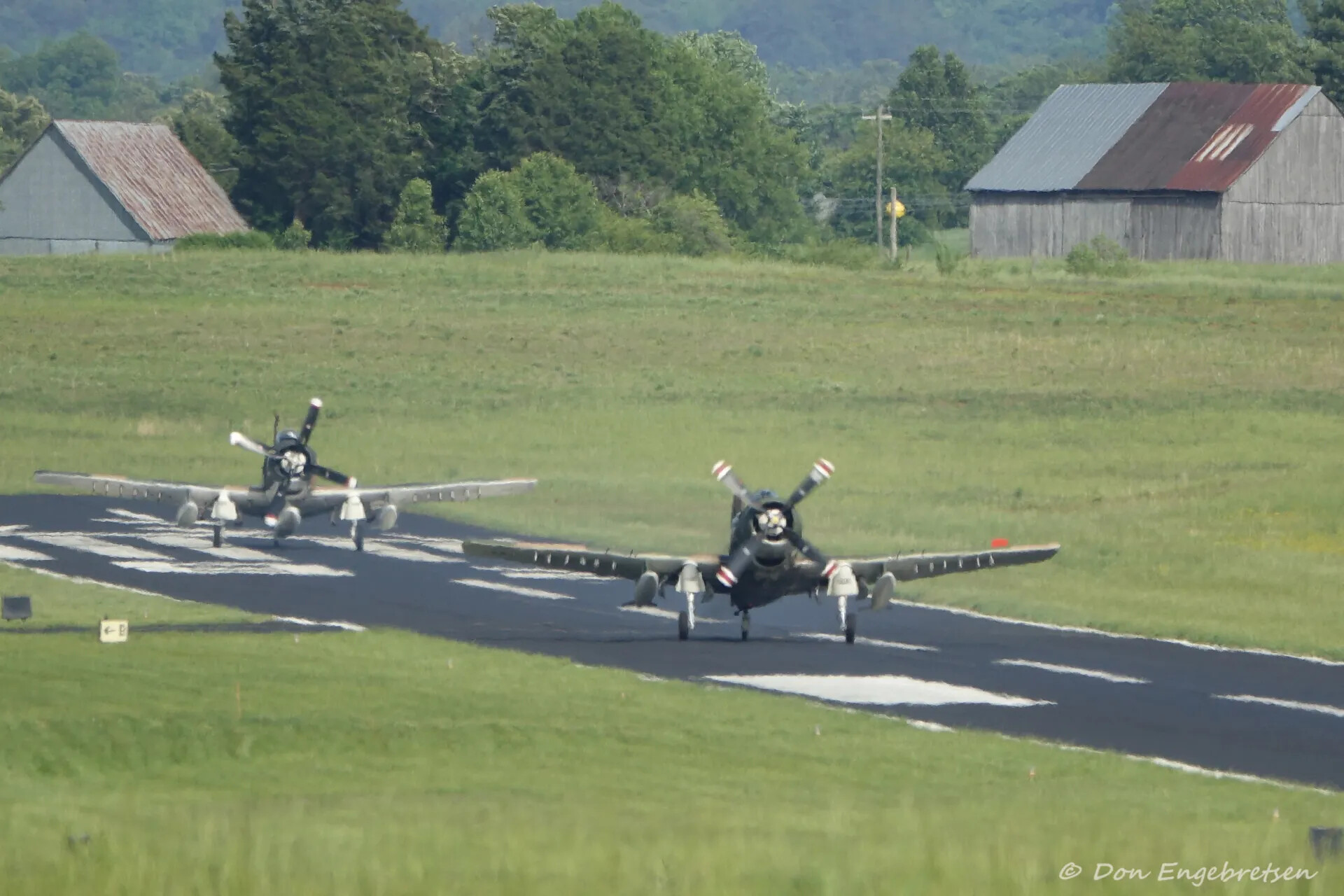 Two A-1 Skyraiders Taxiing at Rural Airfield, May 2019 Reunion Event