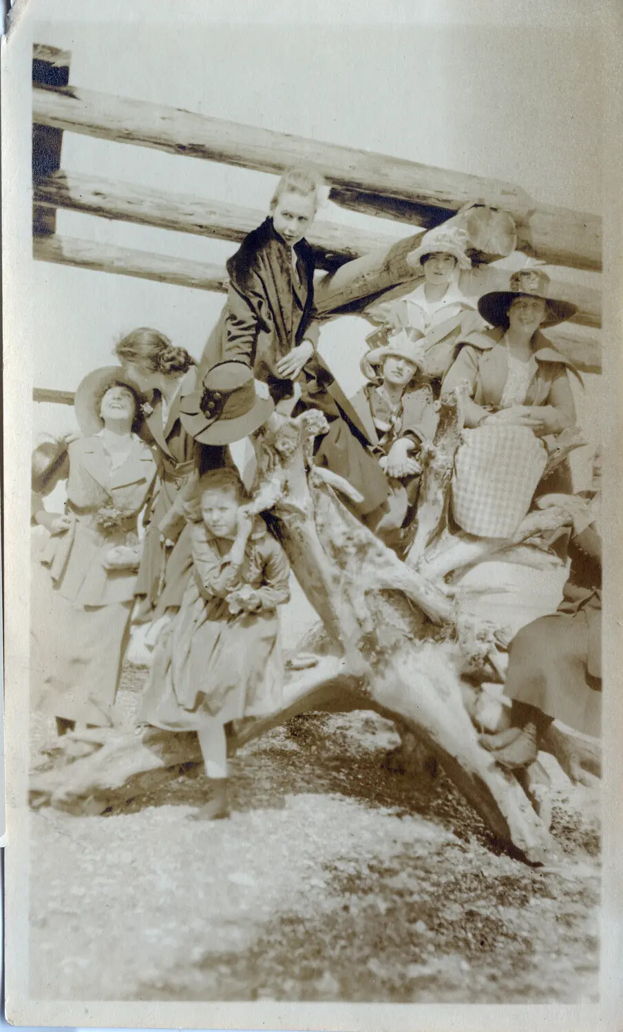 Group Portrait of Young Women and Man on Driftwood, Early 20th Century