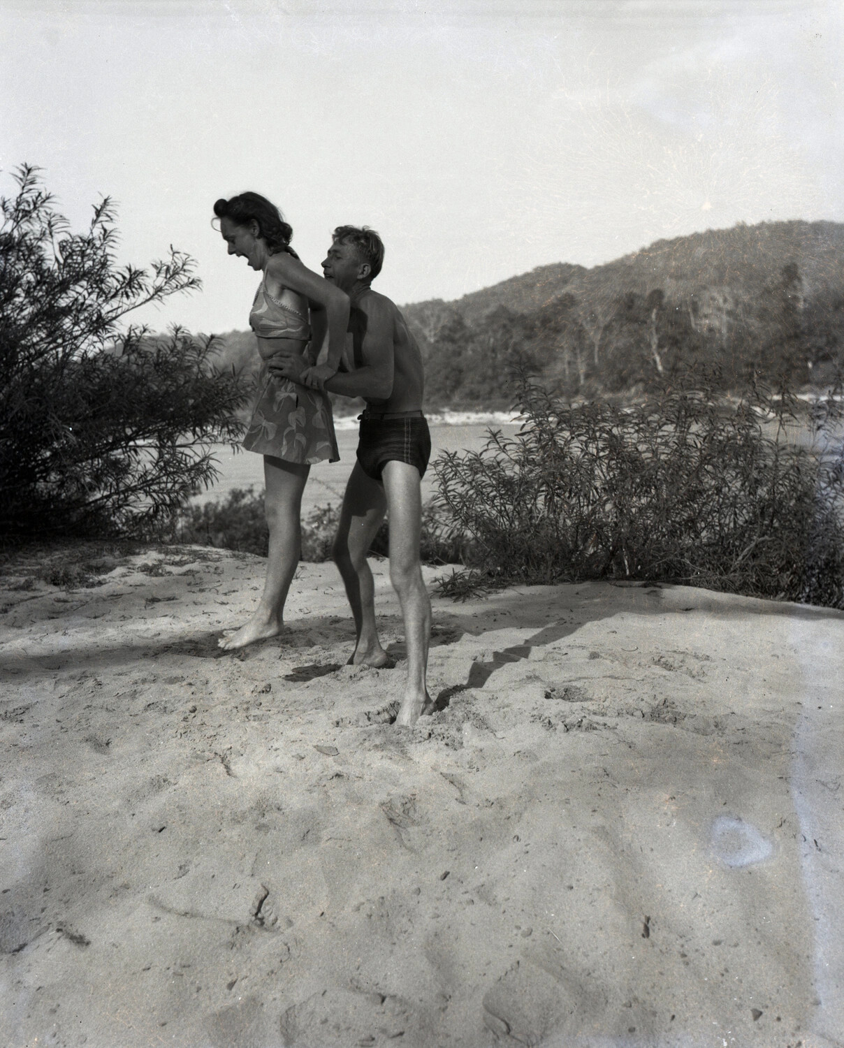 Personal Snapshot of a Young Couple at a Riverside Beach, from a WWII CBI Theater Veteran's Photo Collection