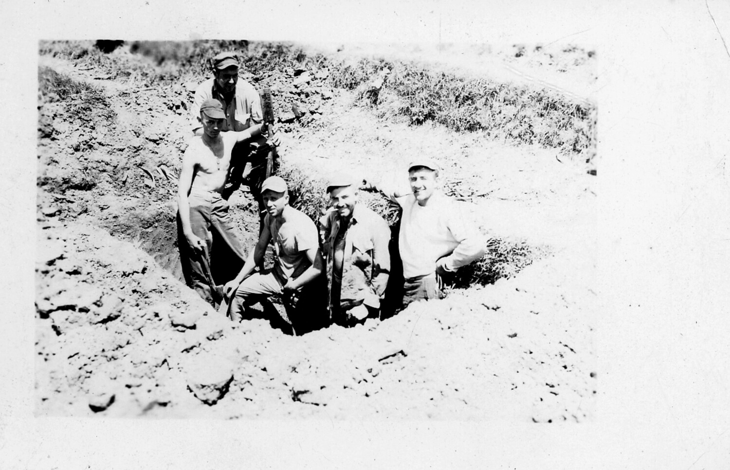 Unidentified Airmen Performing Excavation Duty in Earthen Pit, WWII U.S. Army Air Forces
