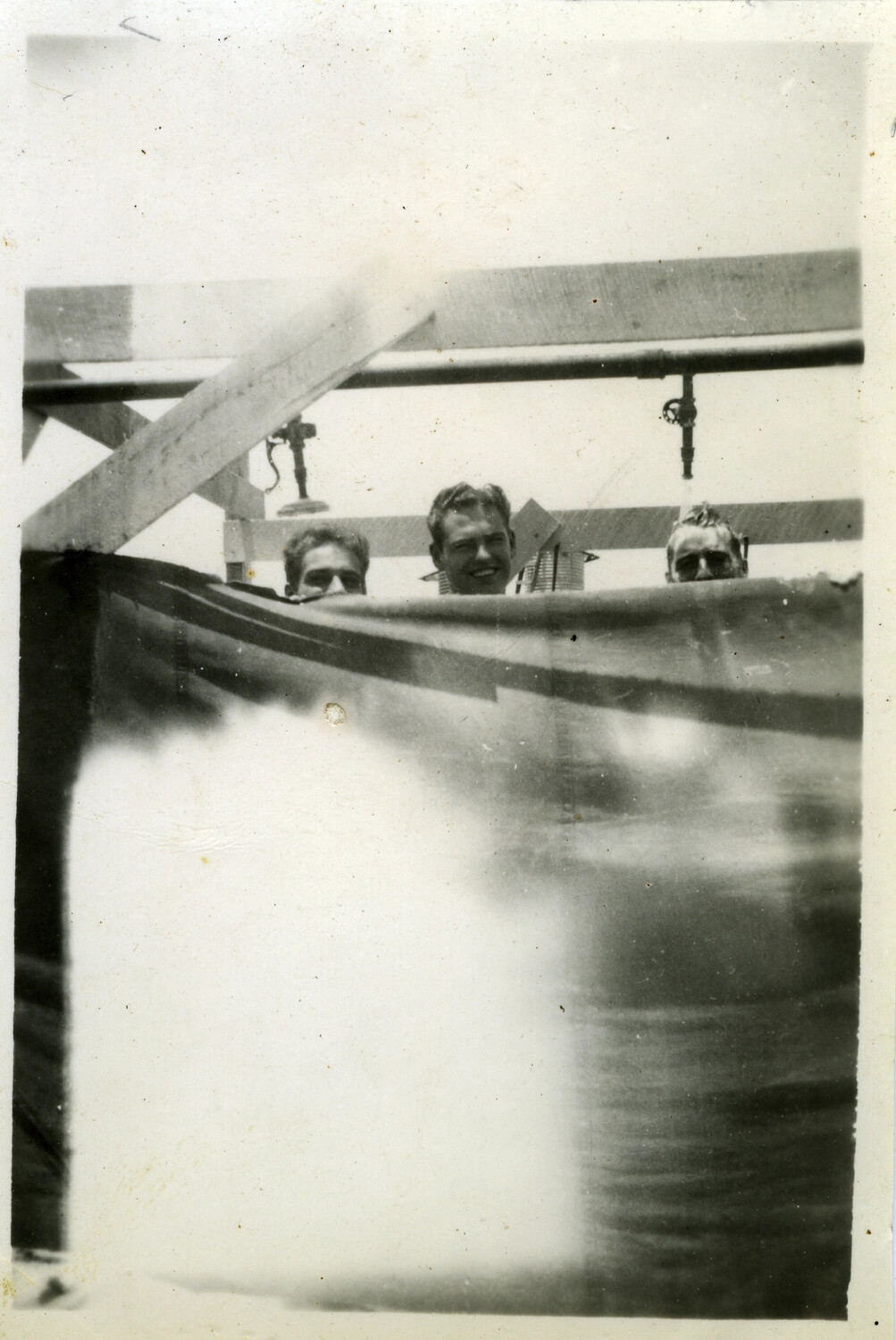 Servicemen Bathing in Improvised Shipboard or Field Shower, Pacific Theater, WWII