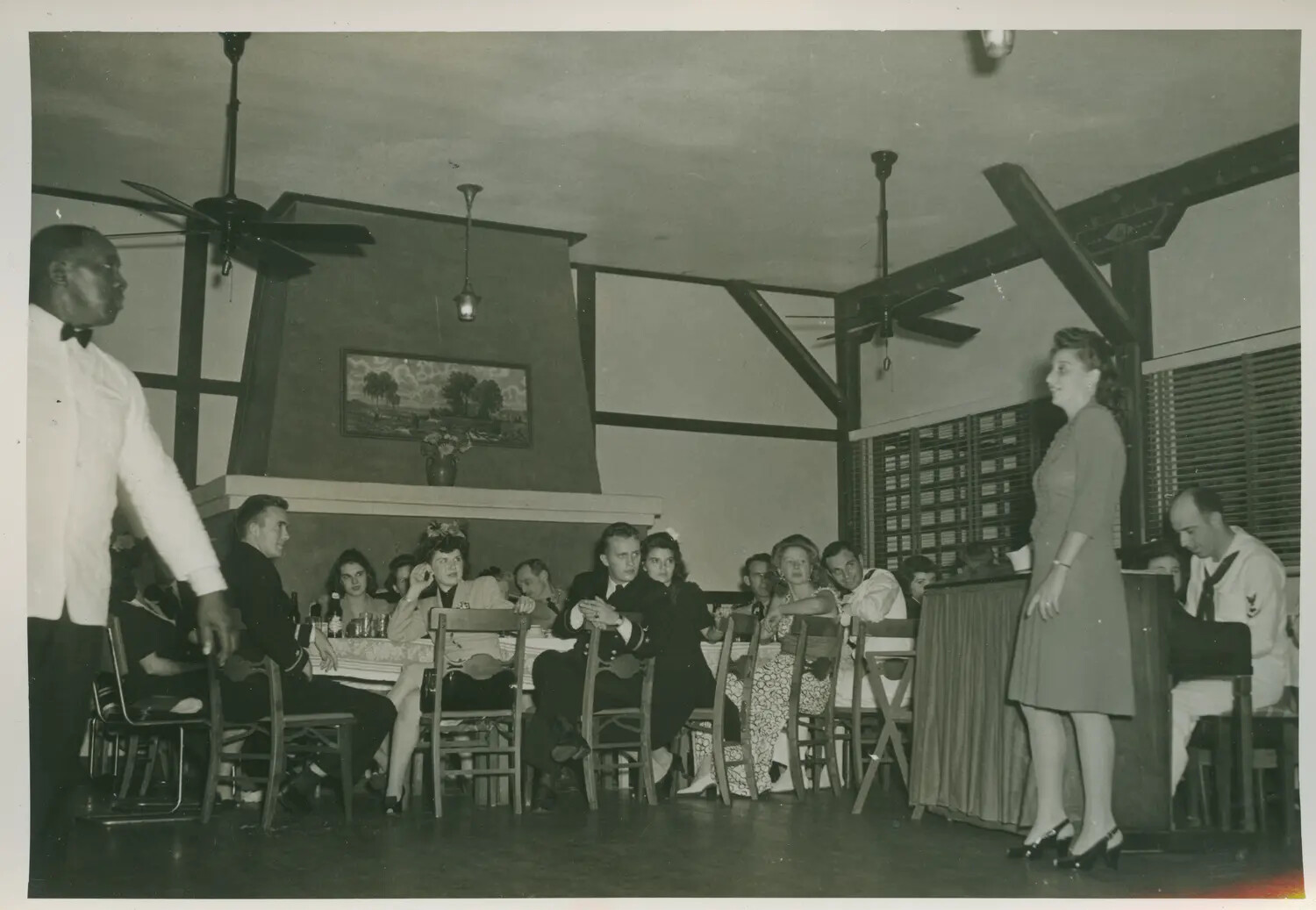 Navy Personnel and Guests at a Social Gathering/Club Event, USS Petrof Bay (CVE-80) Collection, WWII Era