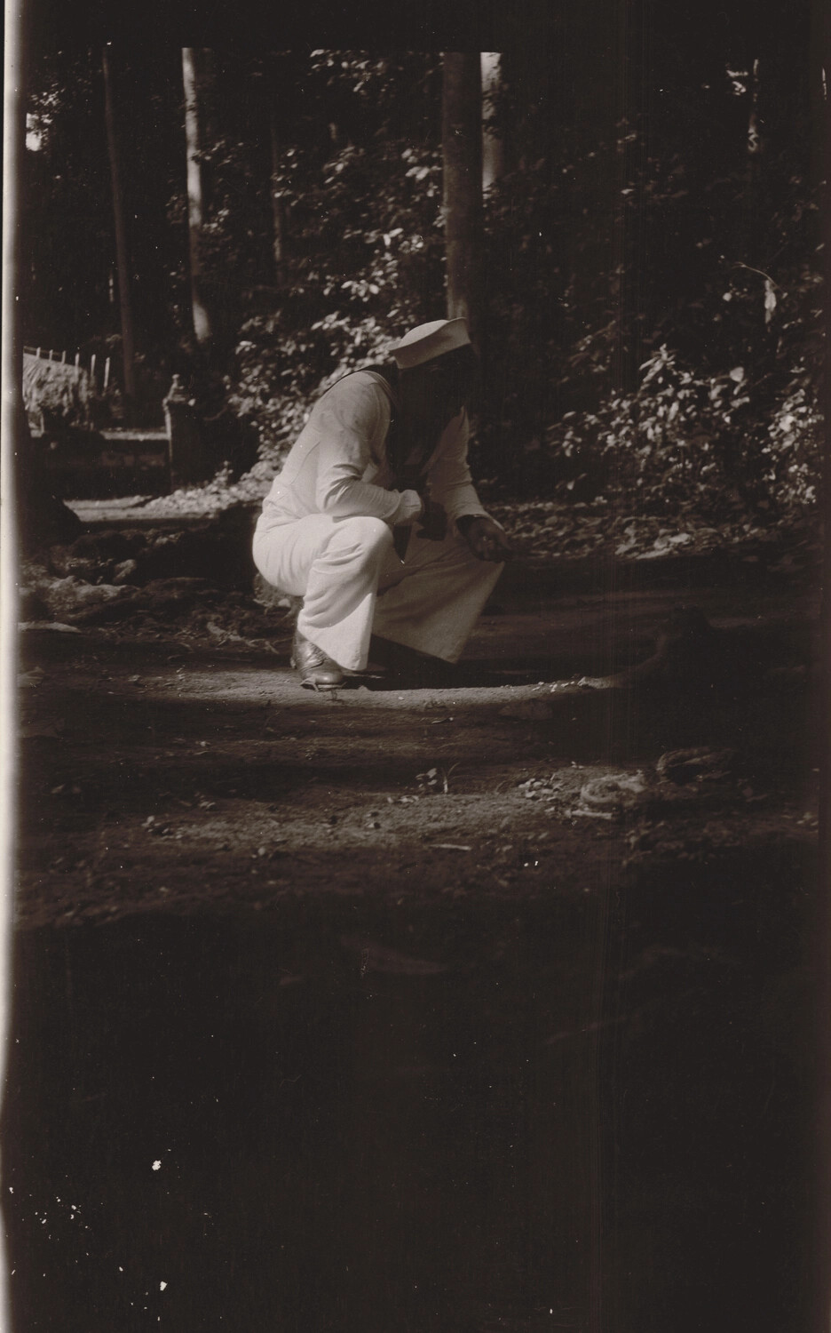 U.S. Navy Sailor Crouching in a Wooded Garden Setting - 1930s China and Pacific Collection