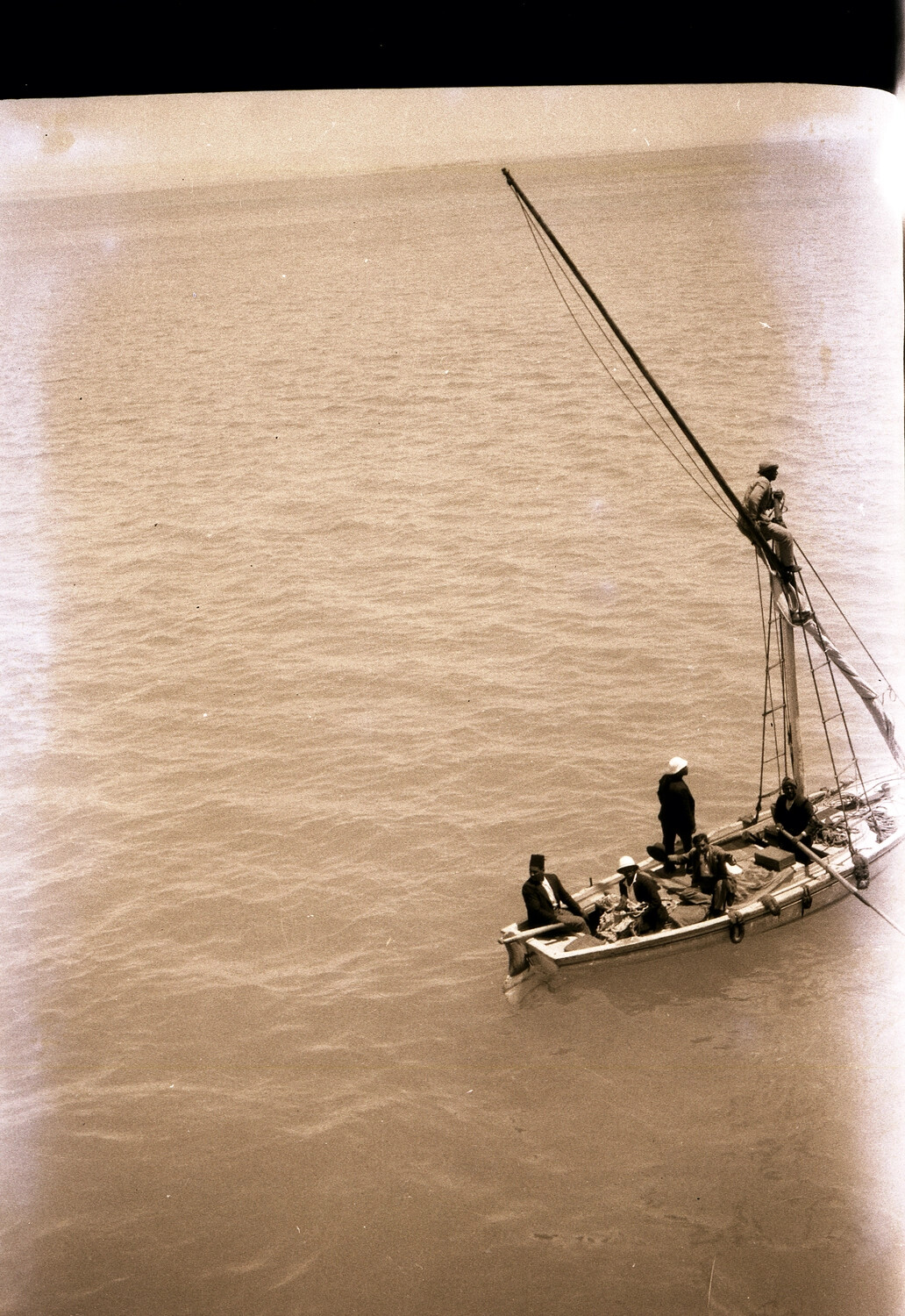 Small Sailing Craft with Local Boatmen, Viewed from U.S. Navy Ship, circa 1920s-1930s (China Station Era)