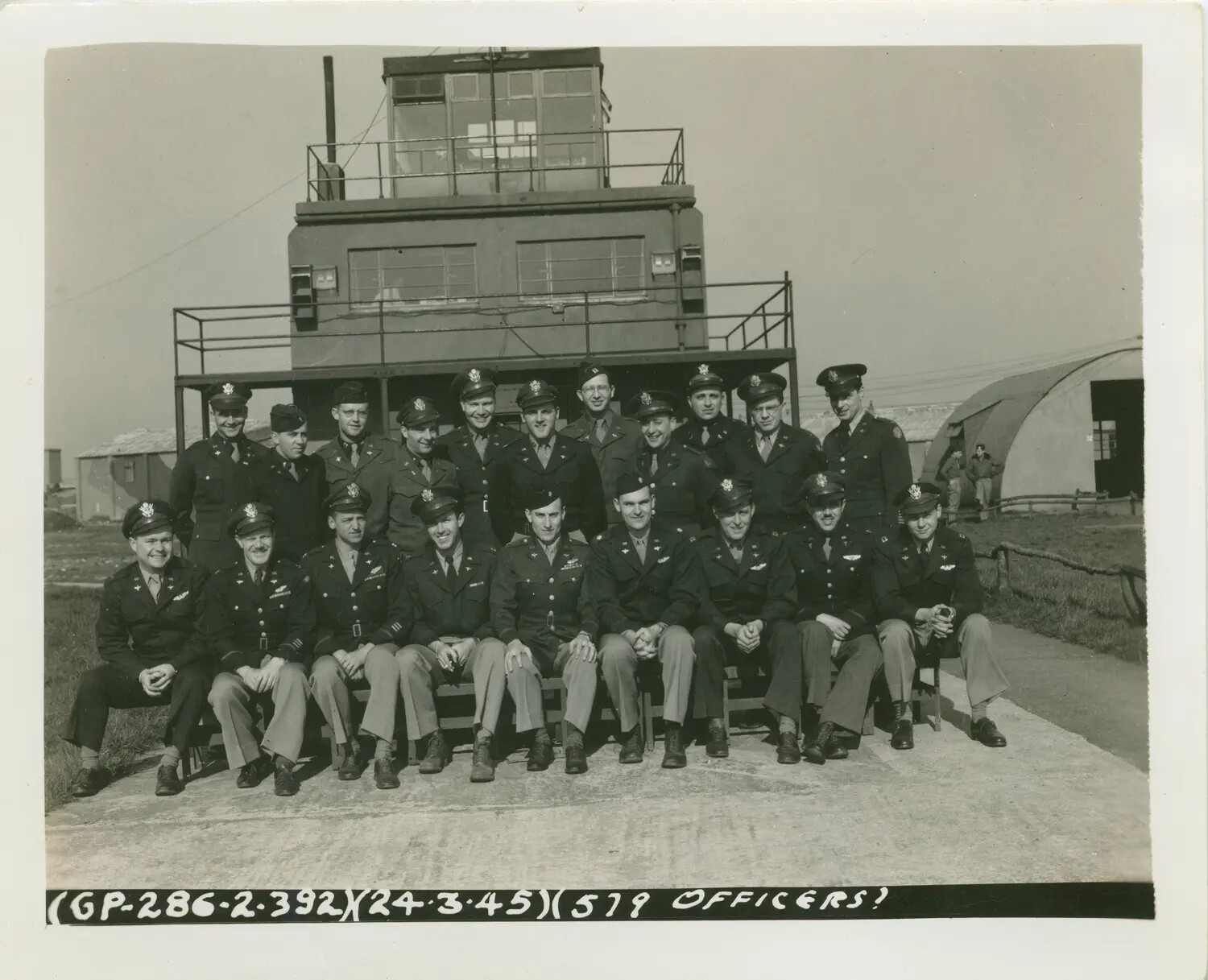 Group Portrait, Officers of the 579th Bomb Squadron, 392nd Bombardment Group, Wendling Airfield, England, 24 March 1945