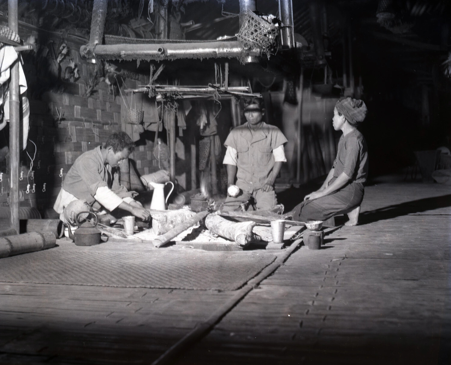Villagers Around Indoor Hearth, China-Burma-India Theater Folklore Documentation