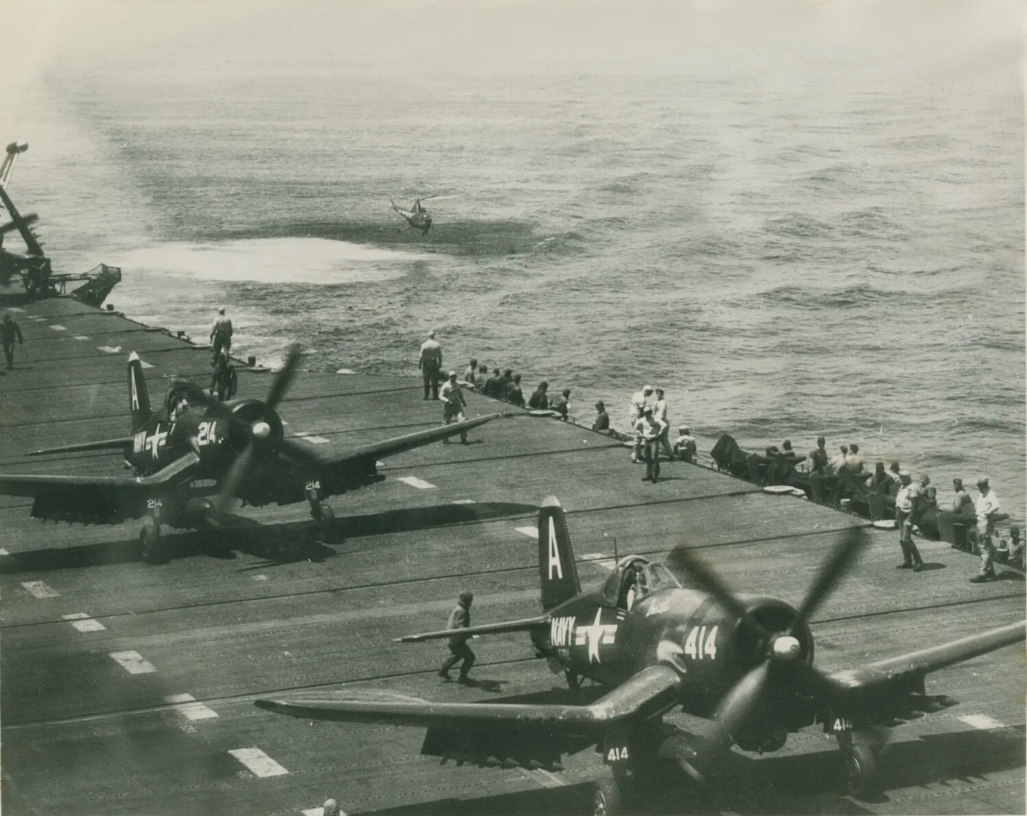 F4U Corsair Fighters on Carrier Flight Deck with Plane Guard Helicopter