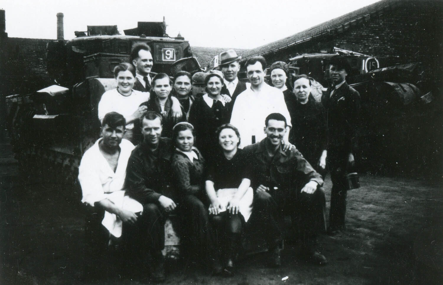 Group Portrait of Civilians and Soldiers with Tracked Vehicles, European Theater, WWII Era