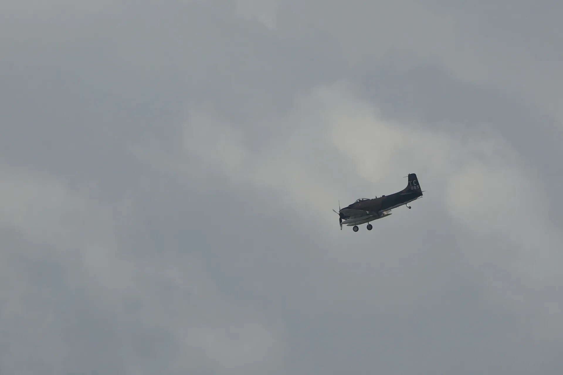 Douglas A-1 Skyraider "TC 685" on Approach, Overcast Sky