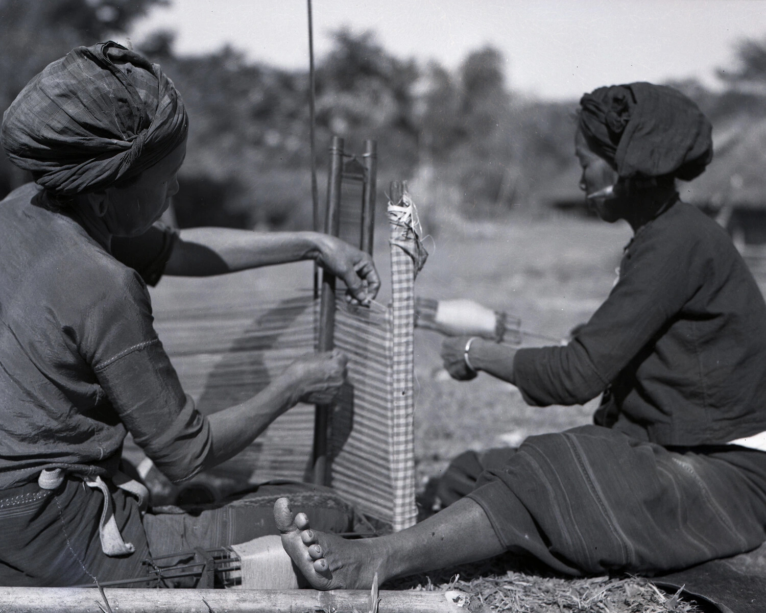 Burmese Women Weaving on a Traditional Loom, China-Burma-India Theater, WWII Era