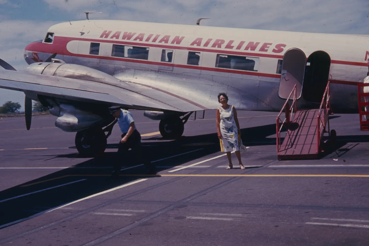 Hawaiian Airlines DC-3 Airliner on Tarmac with Pilot and Passenger, 1968