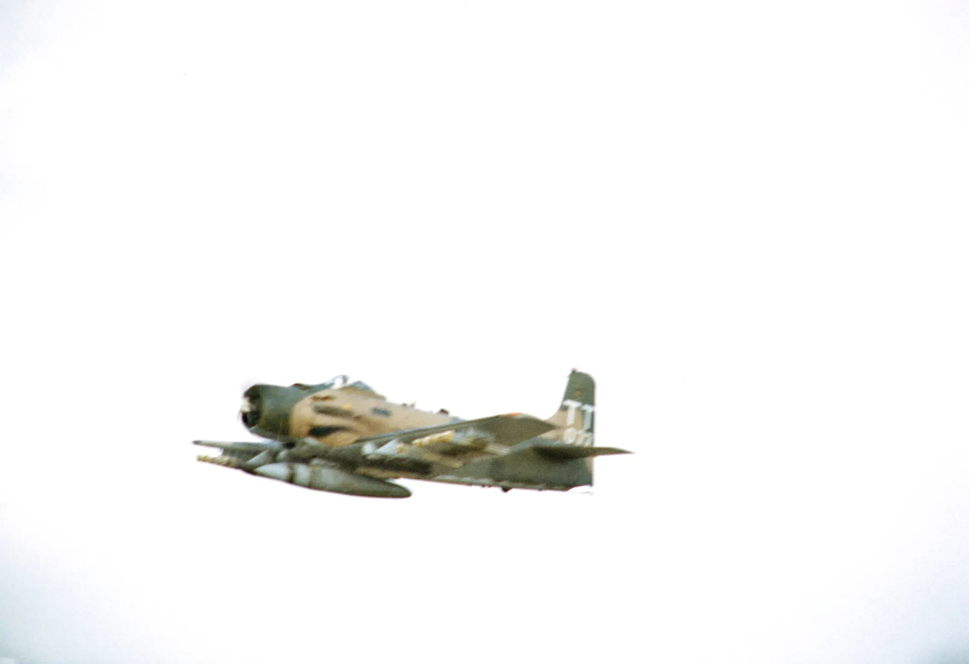 A-1 Skyraider Banking in Flight with Underwing Stores, Vietnam War Era (Don Engebretsen Slide Collection)