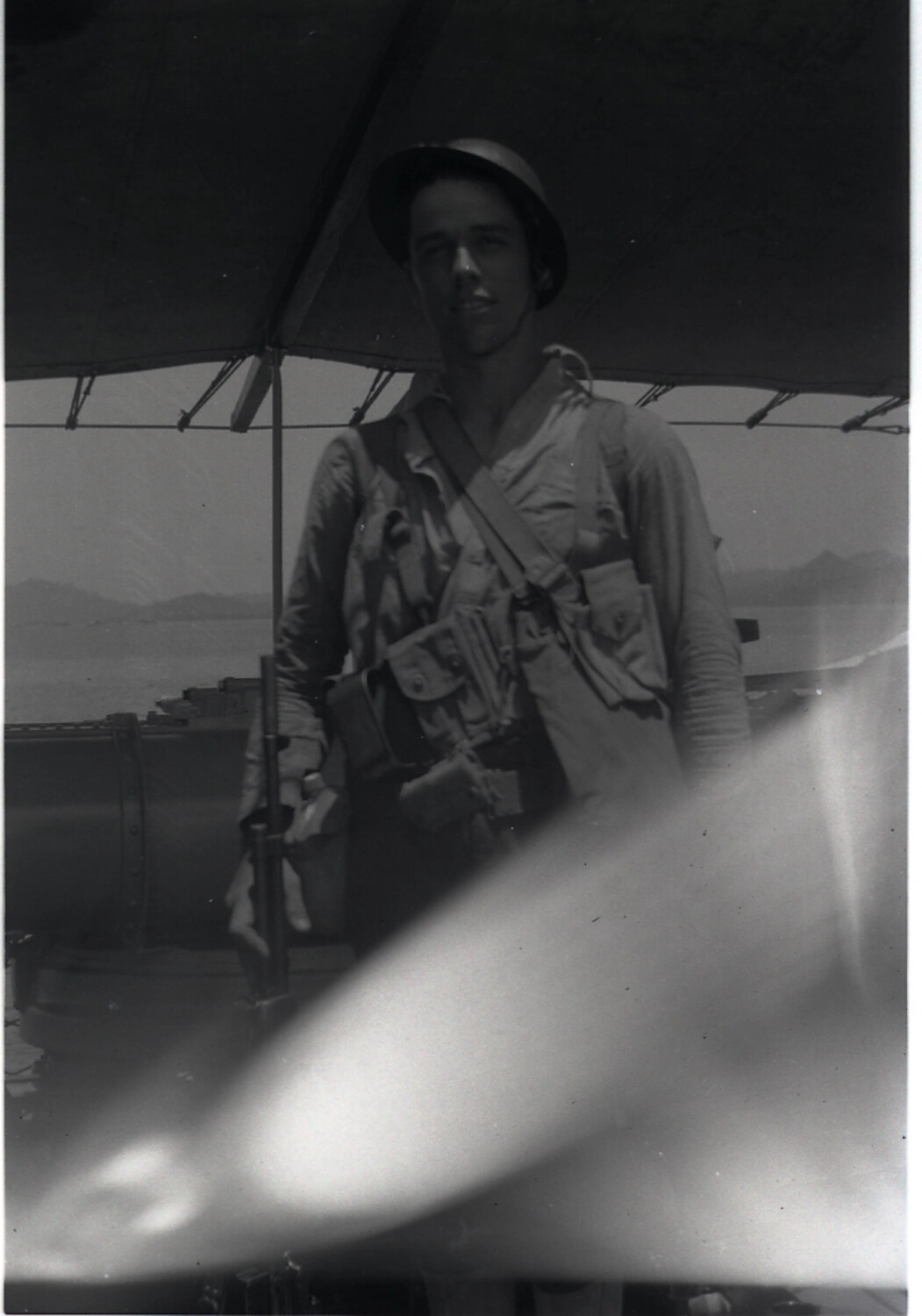 Young Man in Steel Helmet and Webbing Equipment Aboard a Vessel, Wartime China Coast