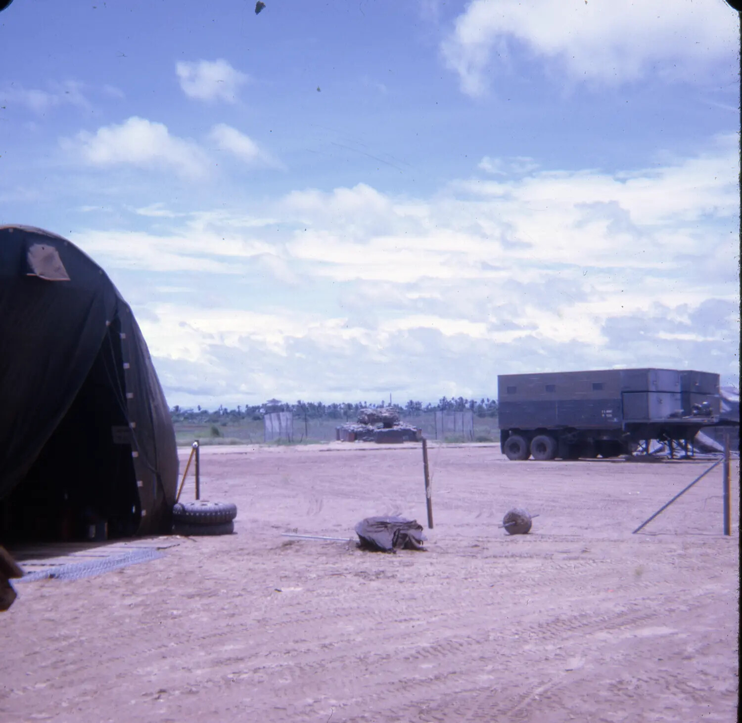Airbase Support Area with Sandbagged Bunker and Equipment Trailer, Vietnam War SAC Installation