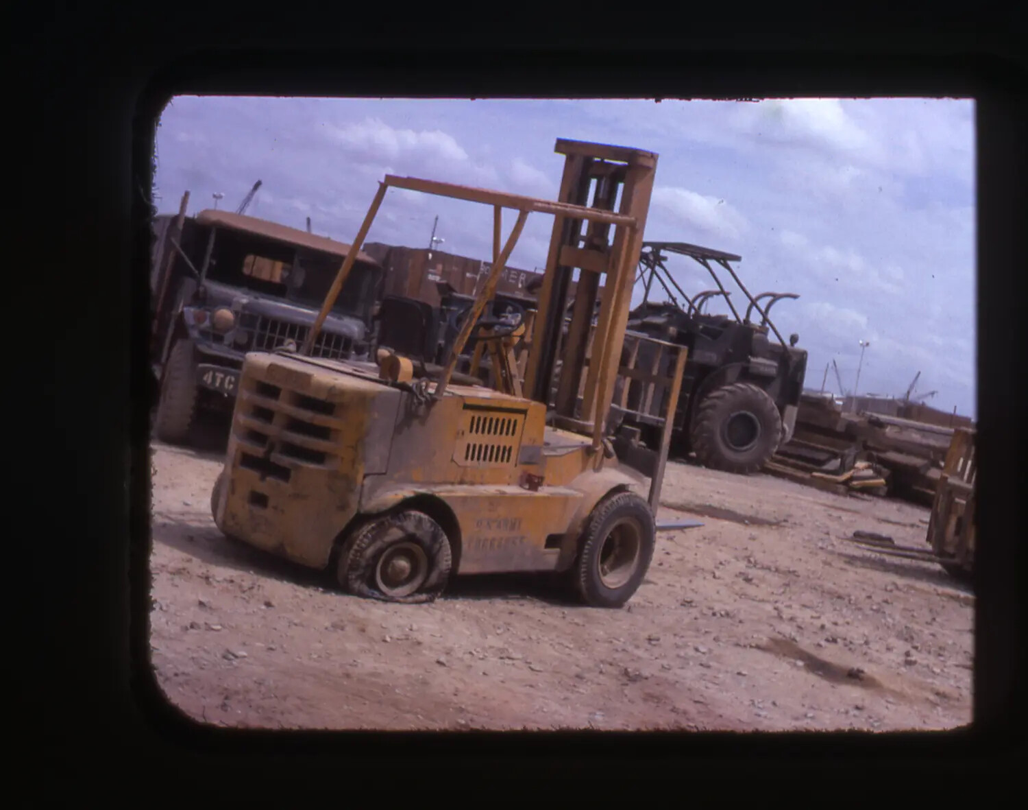 U.S. Army Forklift and Logistics Vehicles at Cam Ranh Bay Supply Yard, Vietnam War