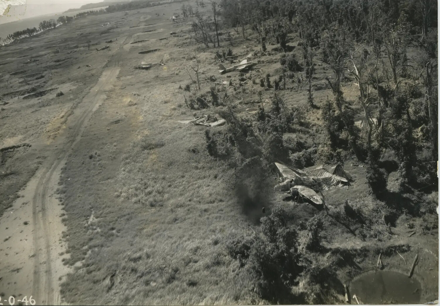 Aerial Damage Assessment of Dispersed Wrecked Aircraft at Japanese Airfield, 312th Bomb Group, WWII Pacific Theater