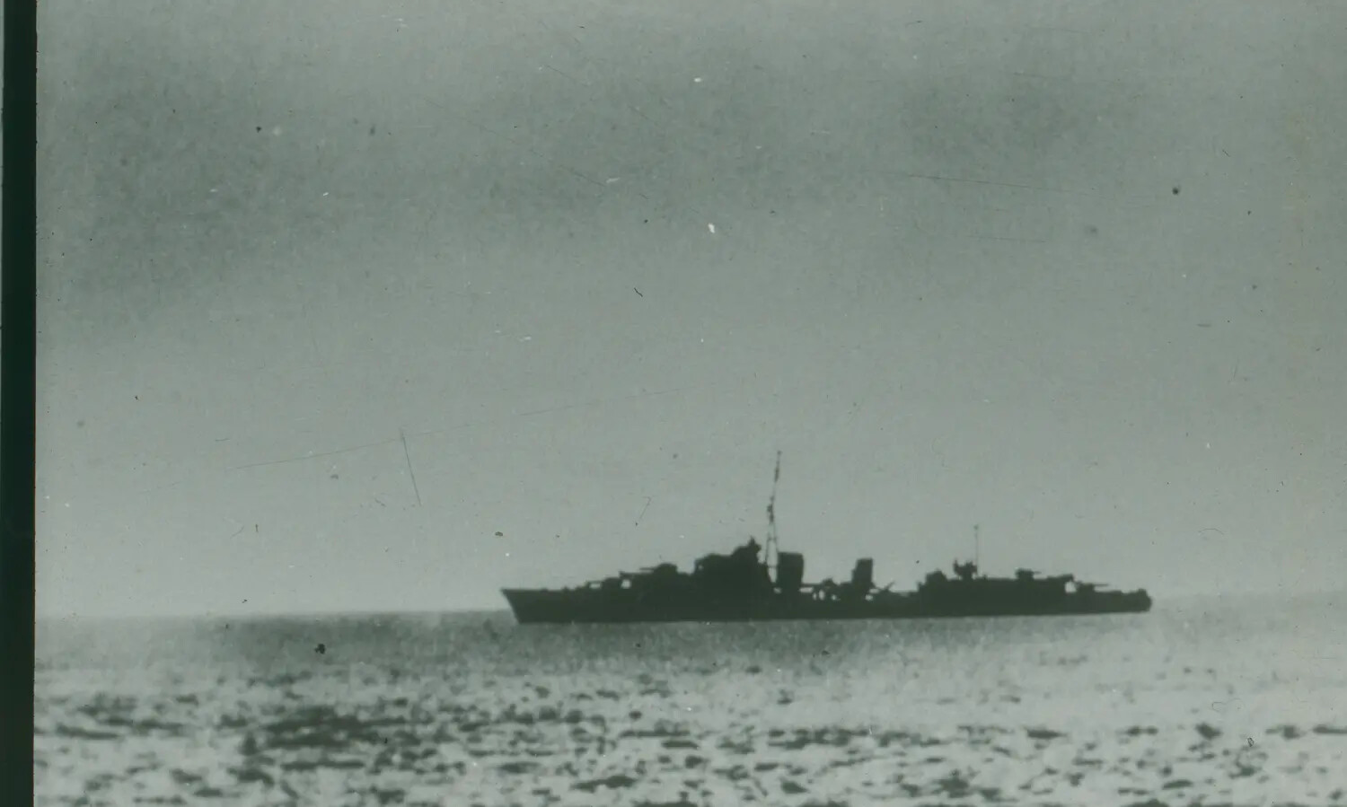 Silhouette of a U.S. Navy Destroyer at Sea, World War II Era