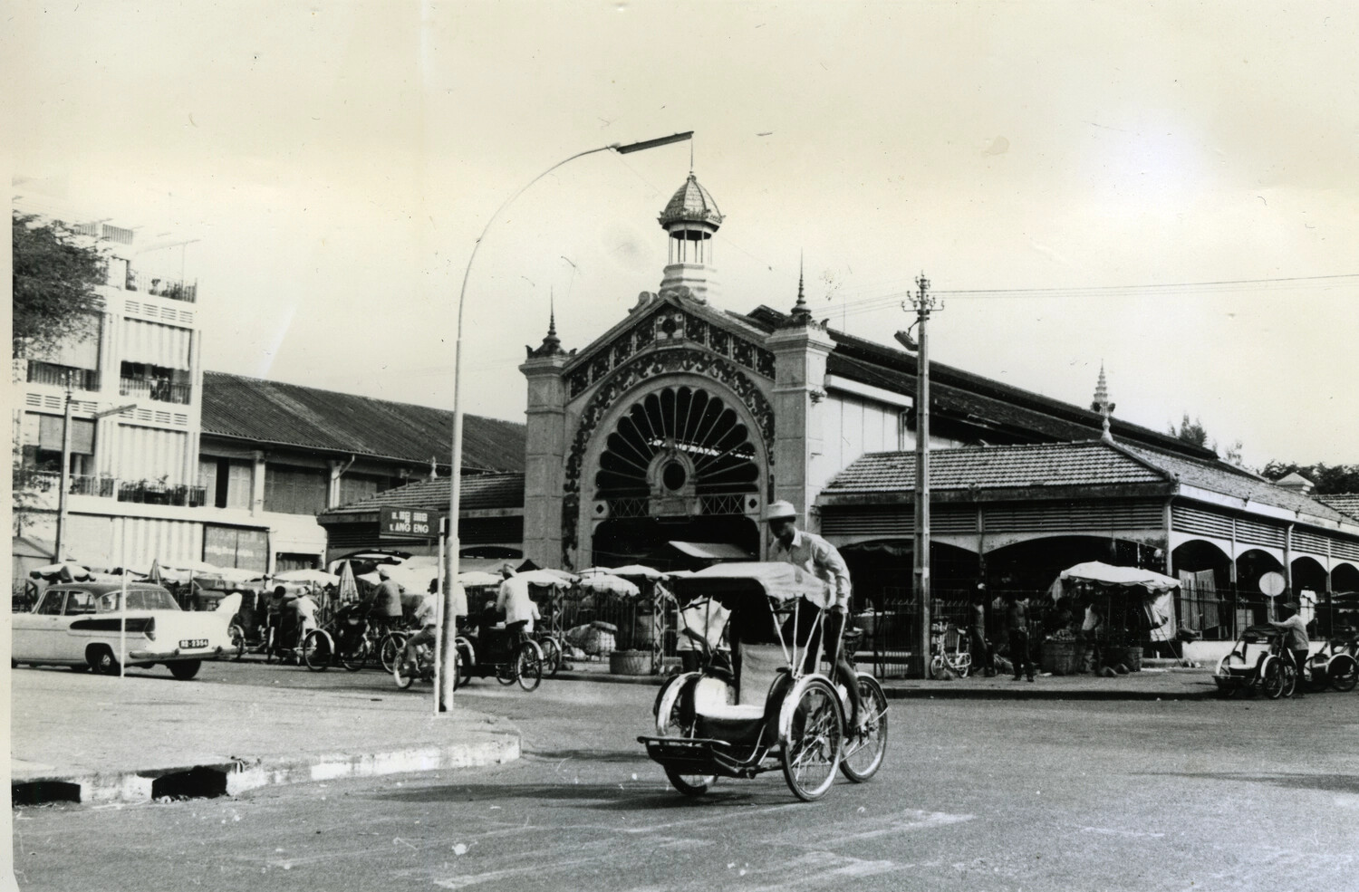 Cyclo and Street Scene at Phnom Penh Central Market, Ang Eng Street, Cambodia
