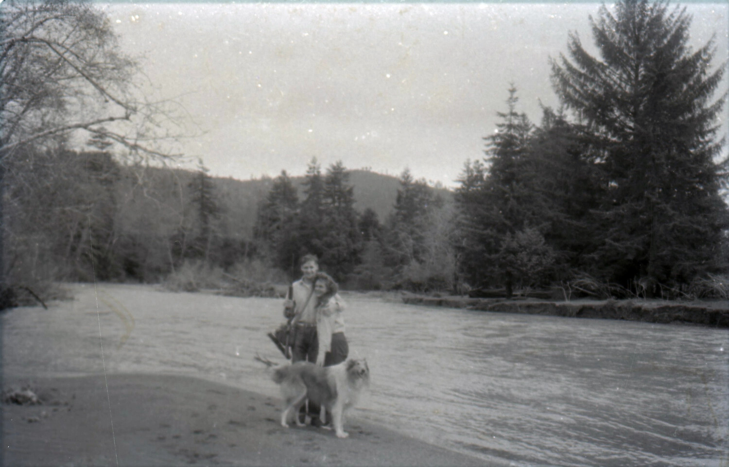 Couple with Collie Dog on Riverbank, Ranch, 1958