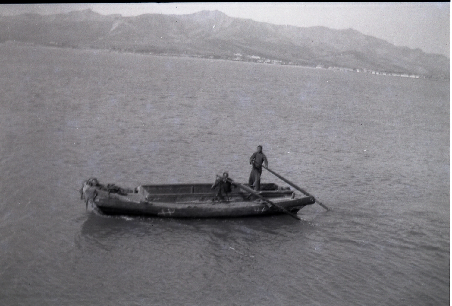 Boatmen Sculling a Sampan, Coastal China