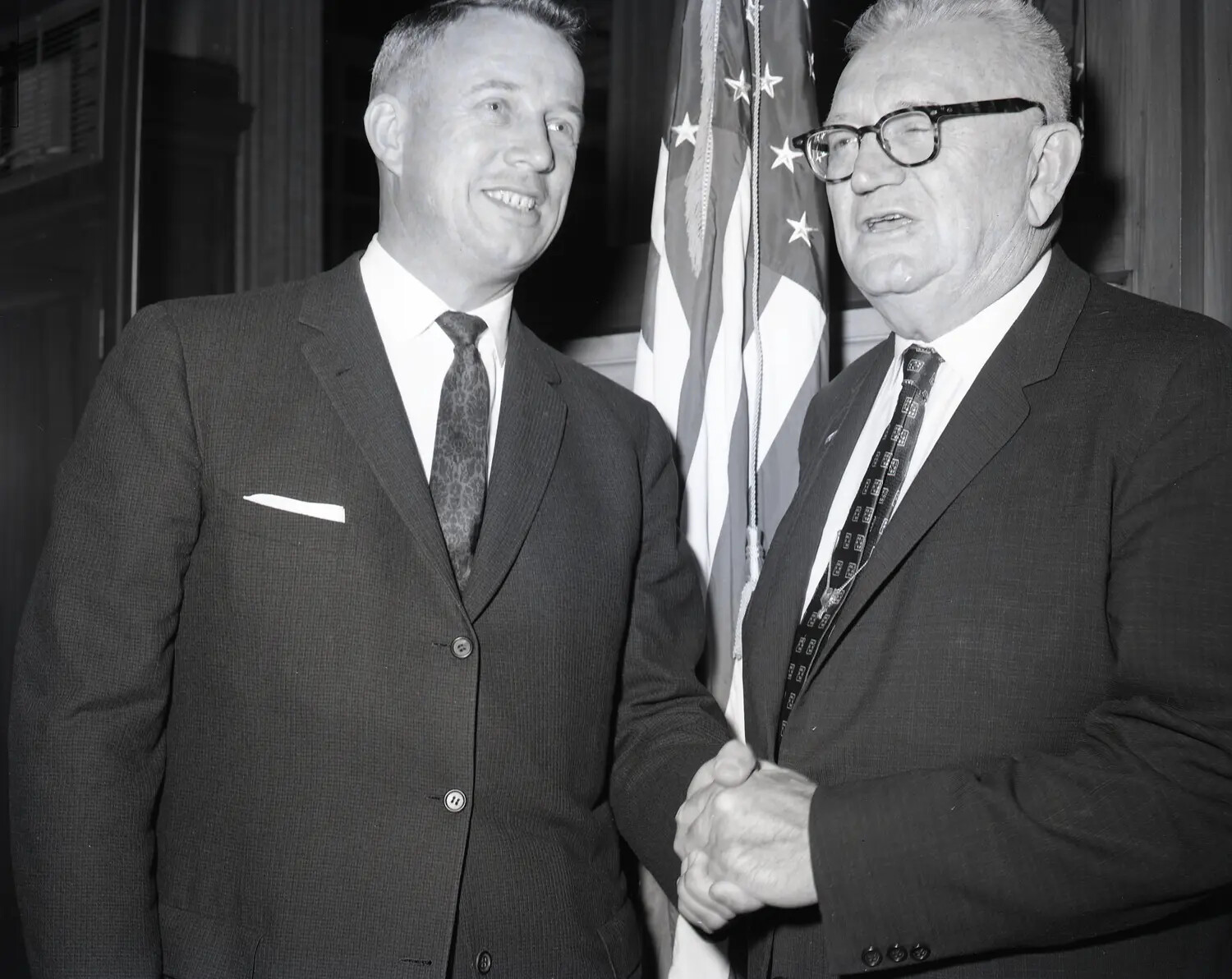 Ceremonial Handshake Portrait (Variant), Two Men Before American Flag