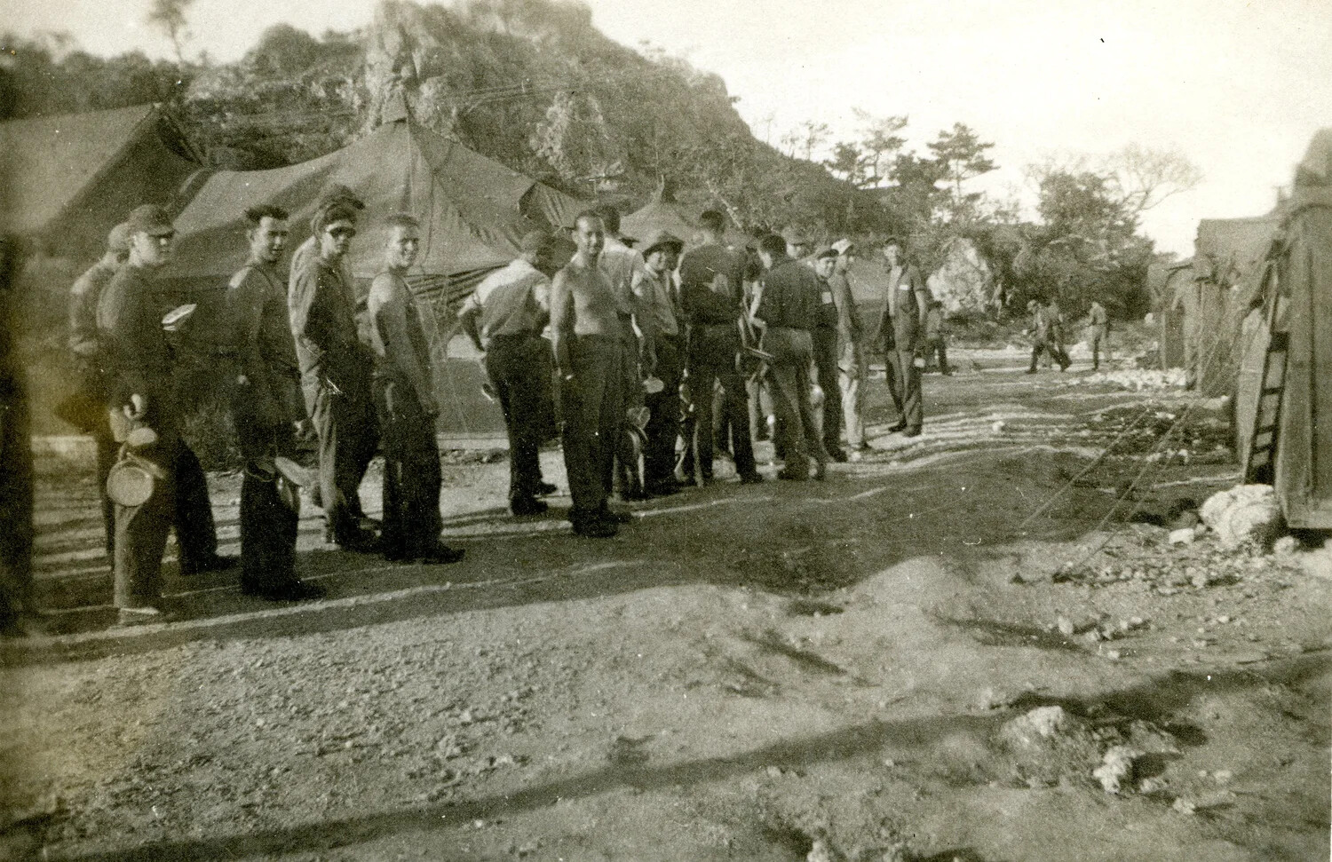 Servicemen Gathered Near Tent Camp, Ie Shima, 345th Bombardment Group, 1945
