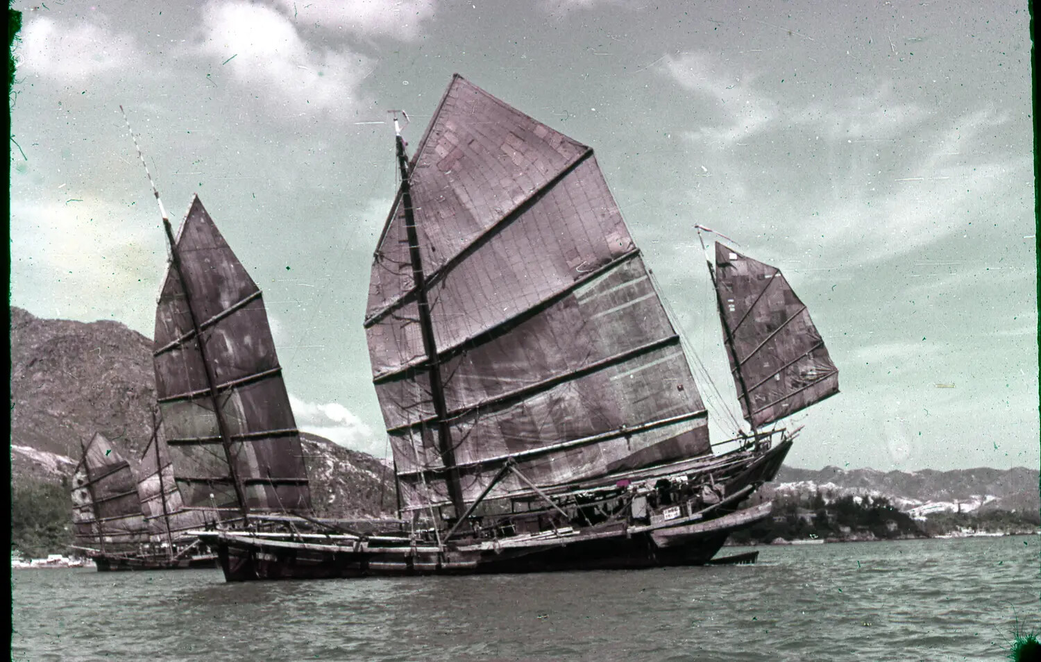 Chinese Junks Under Sail in Harbor, Likely Hong Kong, Vietnam War-Era Liberty Port
