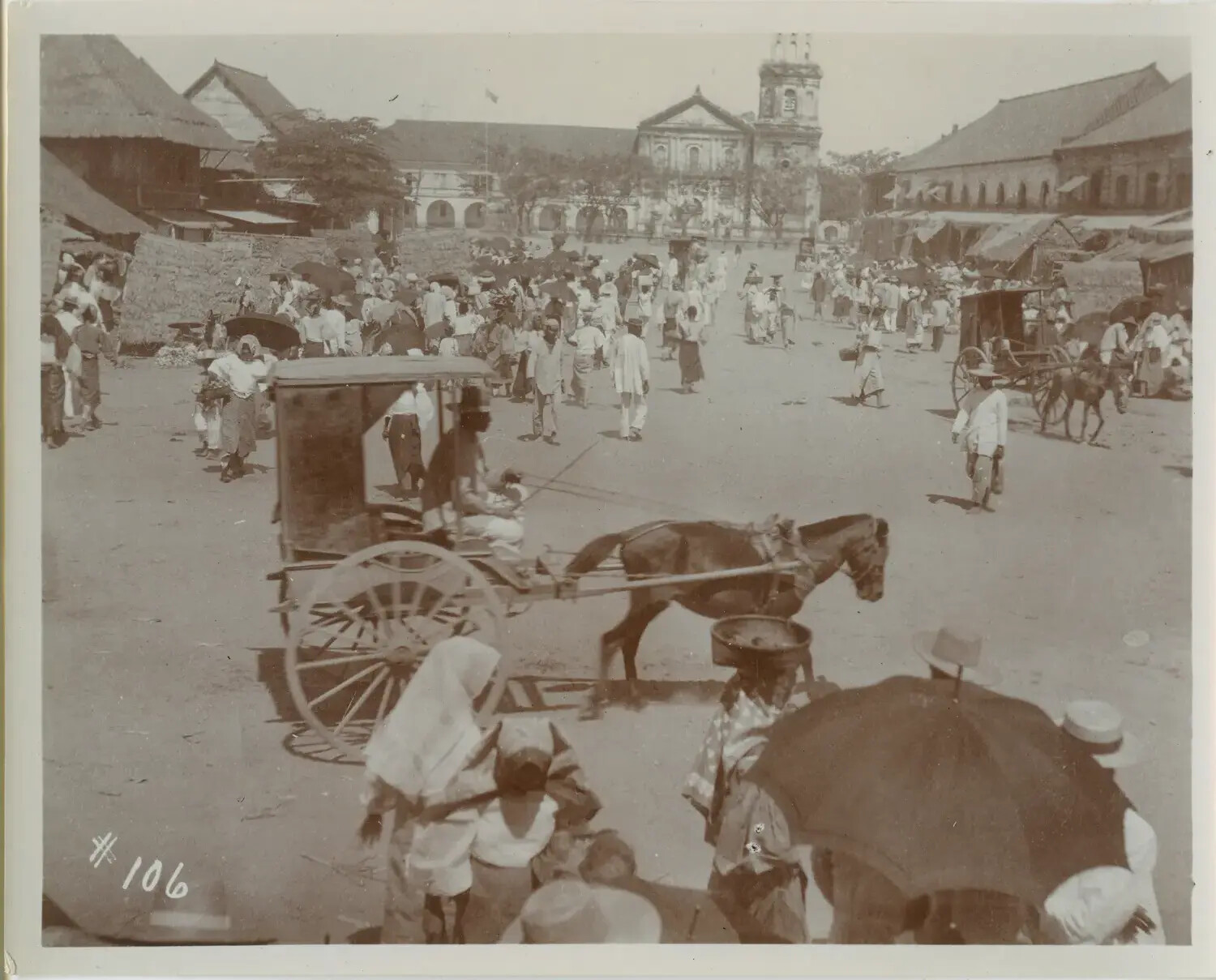 Crowded Town Plaza with Calesas and Church, Philippines, c. 1890s