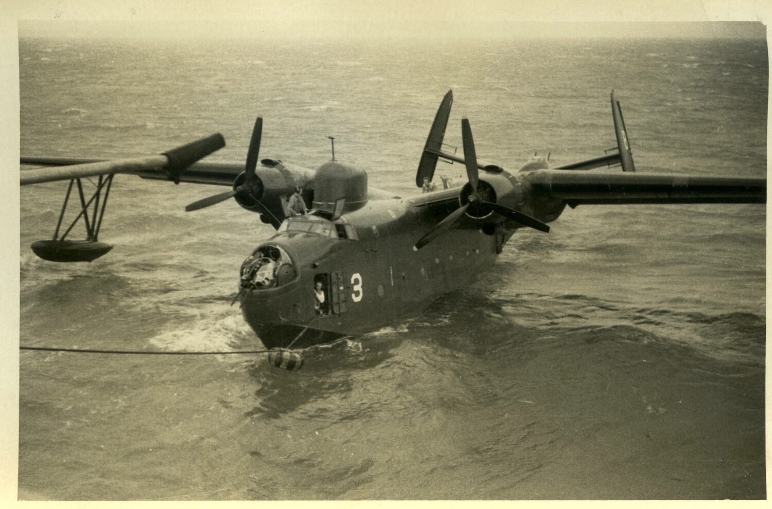 Martin PBM-5 Mariner Flying Boat with Damaged Nose Turret, Riding at Sea
