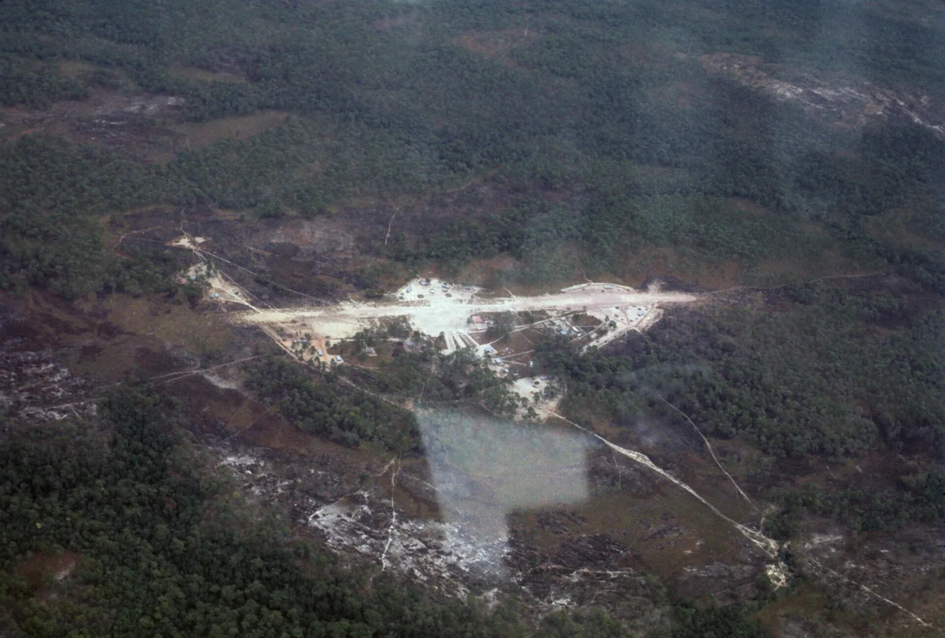 Aerial View of Remote Jungle Airstrip or Outpost