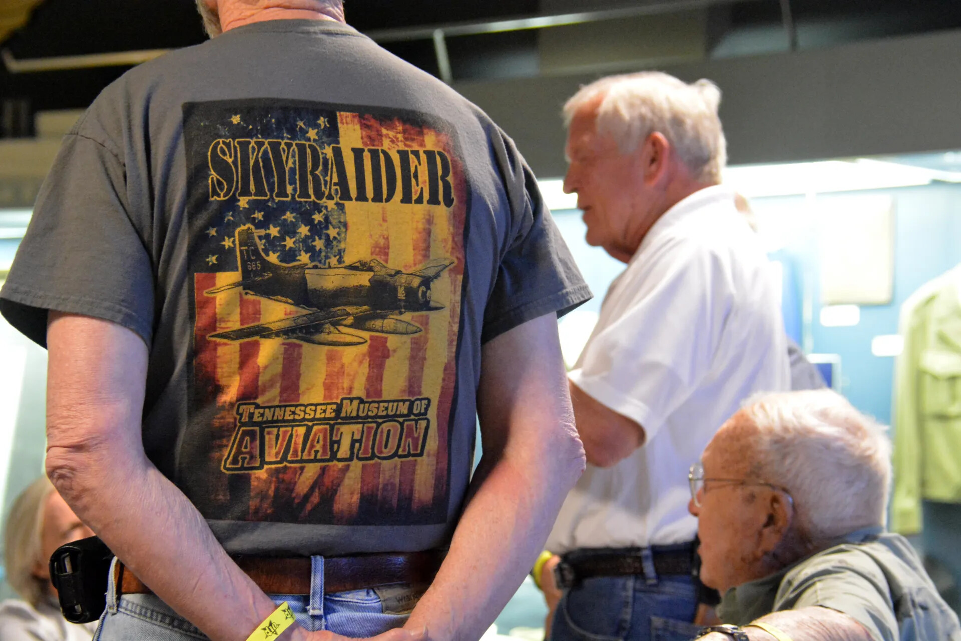 Commemorative "Skyraider" T-Shirt Graphic, Attendees in Conversation, Tennessee Museum of Aviation Reunion, 2 May 2015