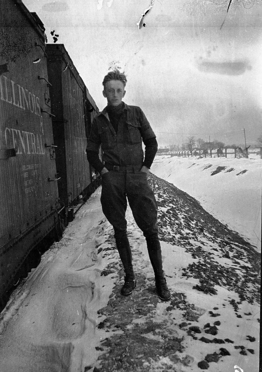 Soldier Beside Illinois Central Railroad Boxcar in Snow, Scott Field Era, WWI