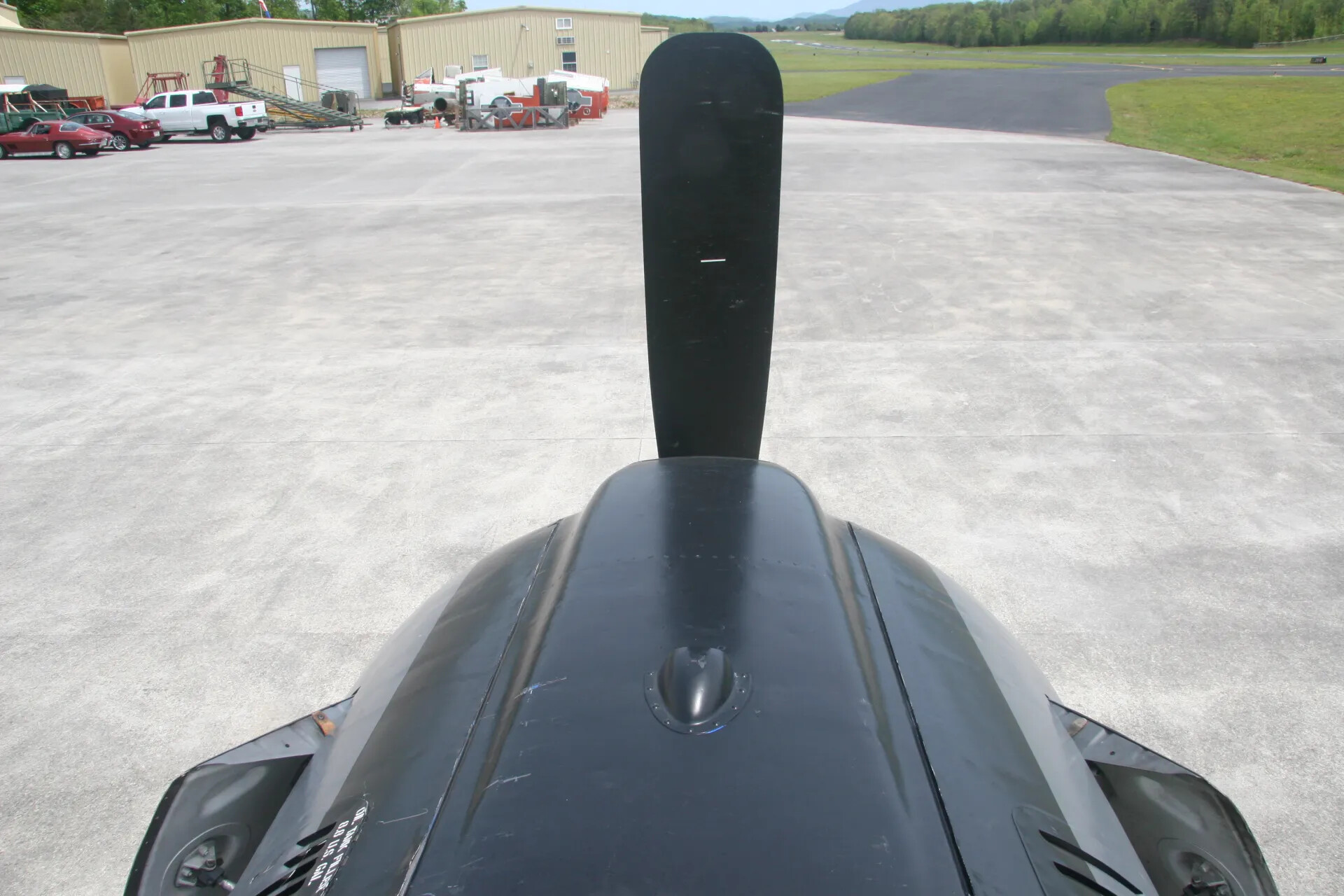 Top-Down View of Radial Engine Cowling and Propeller Blade, Airport Ramp — Operation Tailwind Event, April 30, 2016