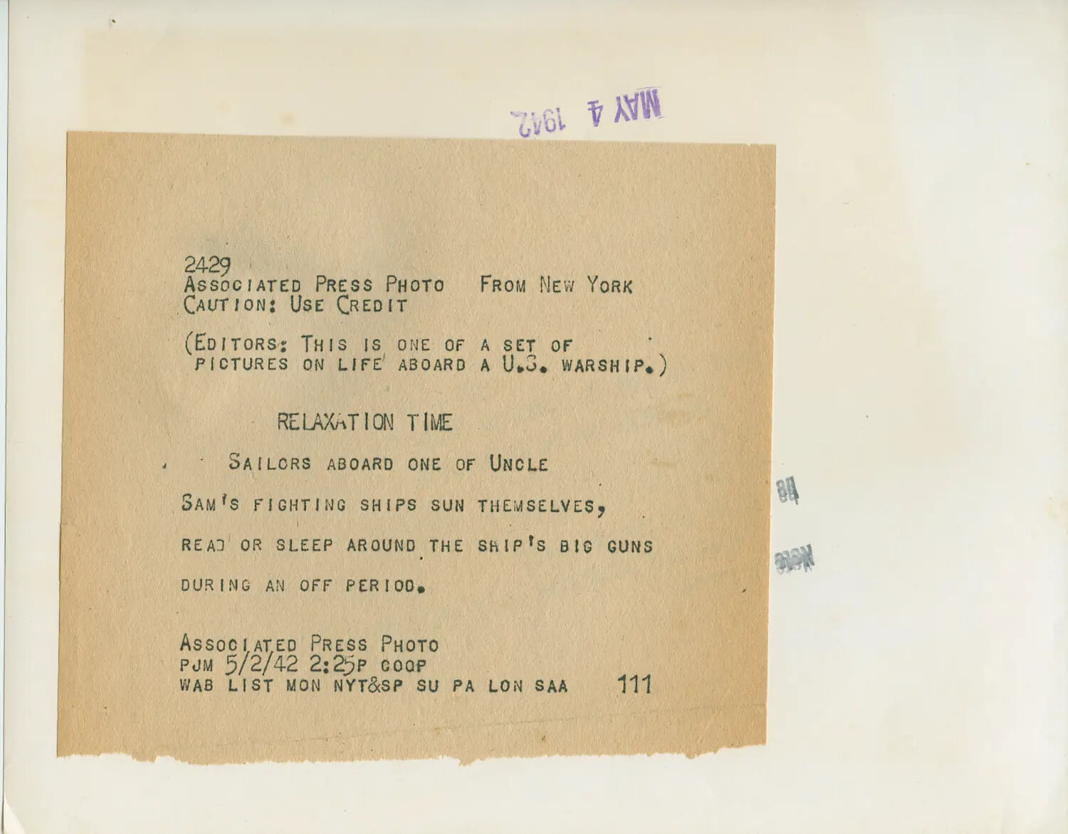 Verso of Associated Press Photo Caption - 'Relaxation Time,' Sailors Aboard a U.S. Warship, 1942