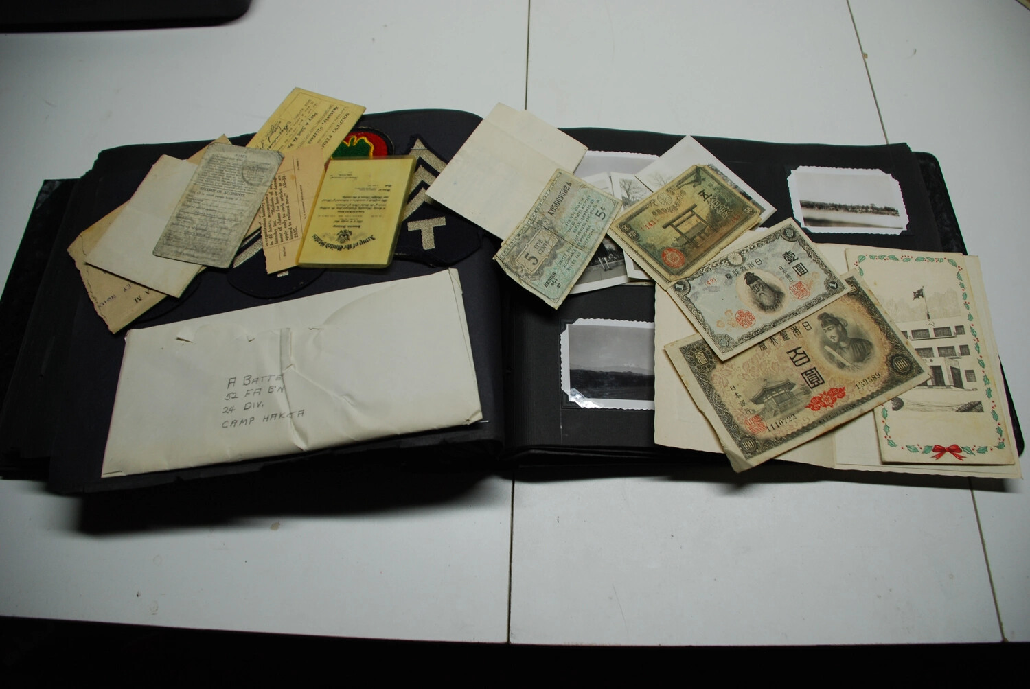 Military Ephemera and Occupation Currency from a 24th Infantry Division Soldier's Photo Album, Japan
