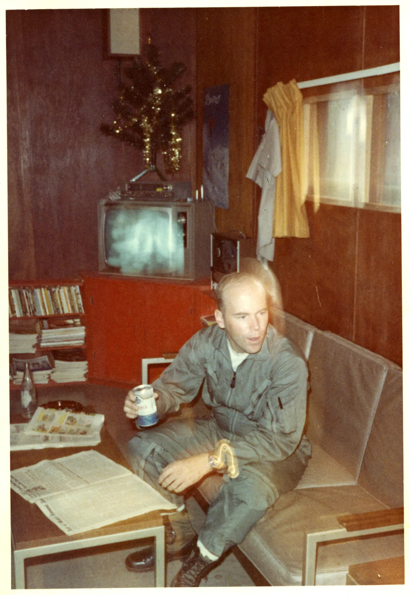 Airman Relaxing with Beer in Day Room, NKP, Thailand (Christmas Season)