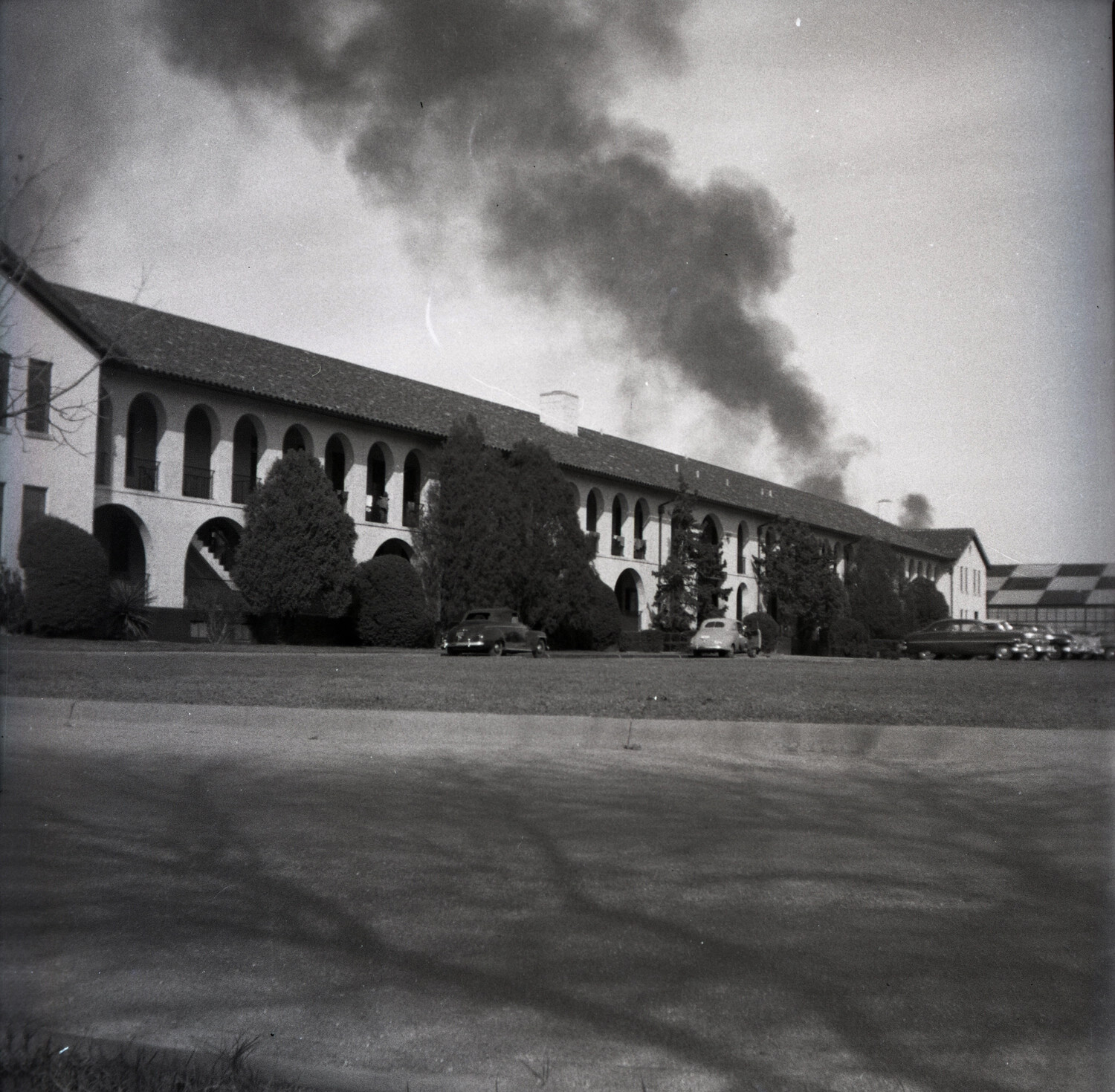 Barracks Building Beneath Plume of Black Smoke, Alternate Angle, USAF Base, 1950s
