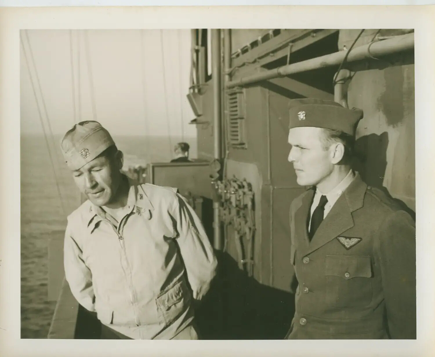 Two Officers on the Weather Deck of USS Petrof Bay (CVE-80), WWII Pacific Theater